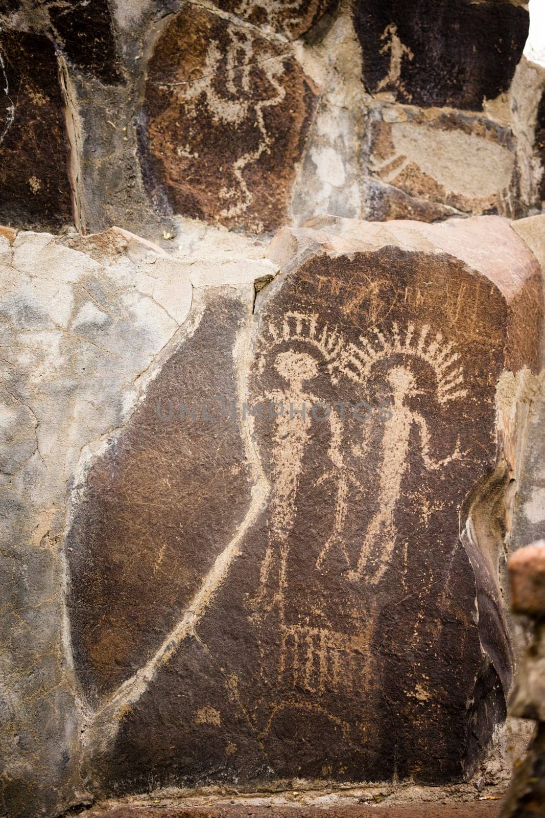 Primitive rock drawings hundreds of years old we call Petroglyphs