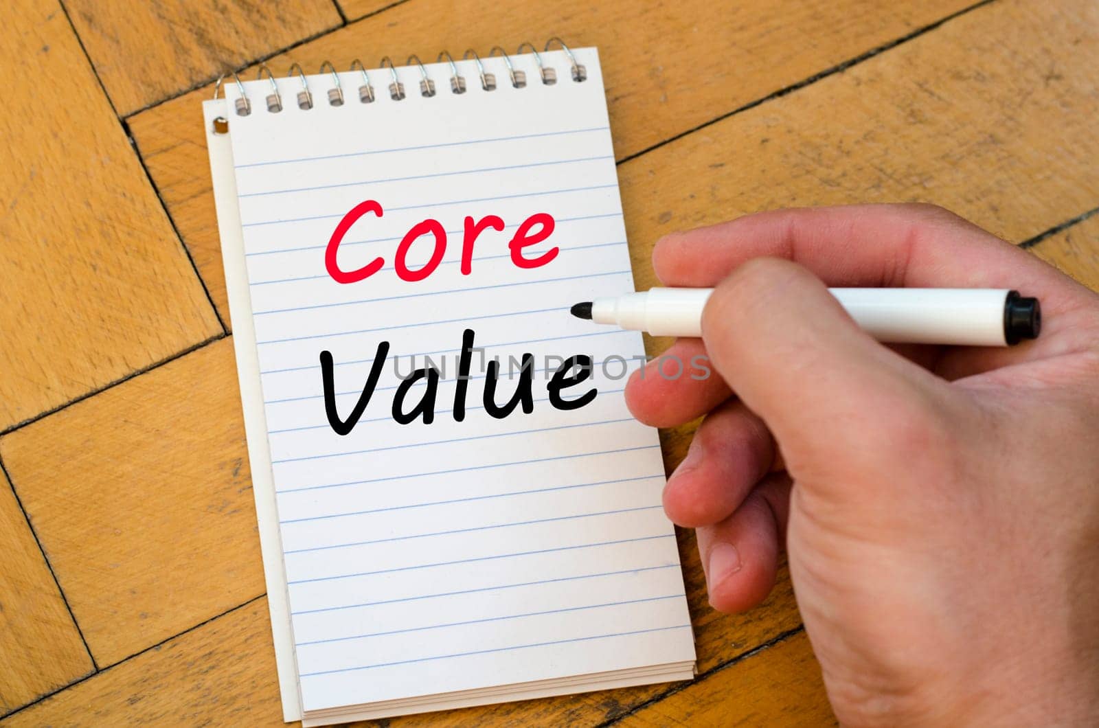 Core value text concept write on notebook