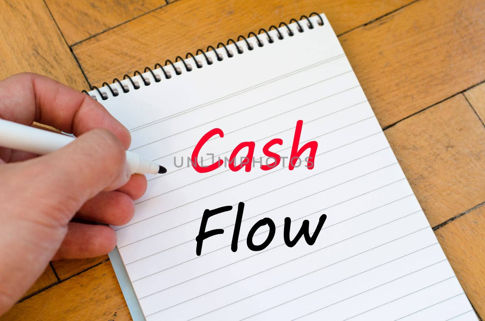 Cash flow text concept write on notebook