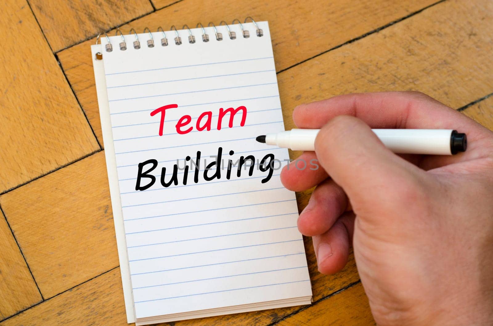 Team building text concept write on notebook
