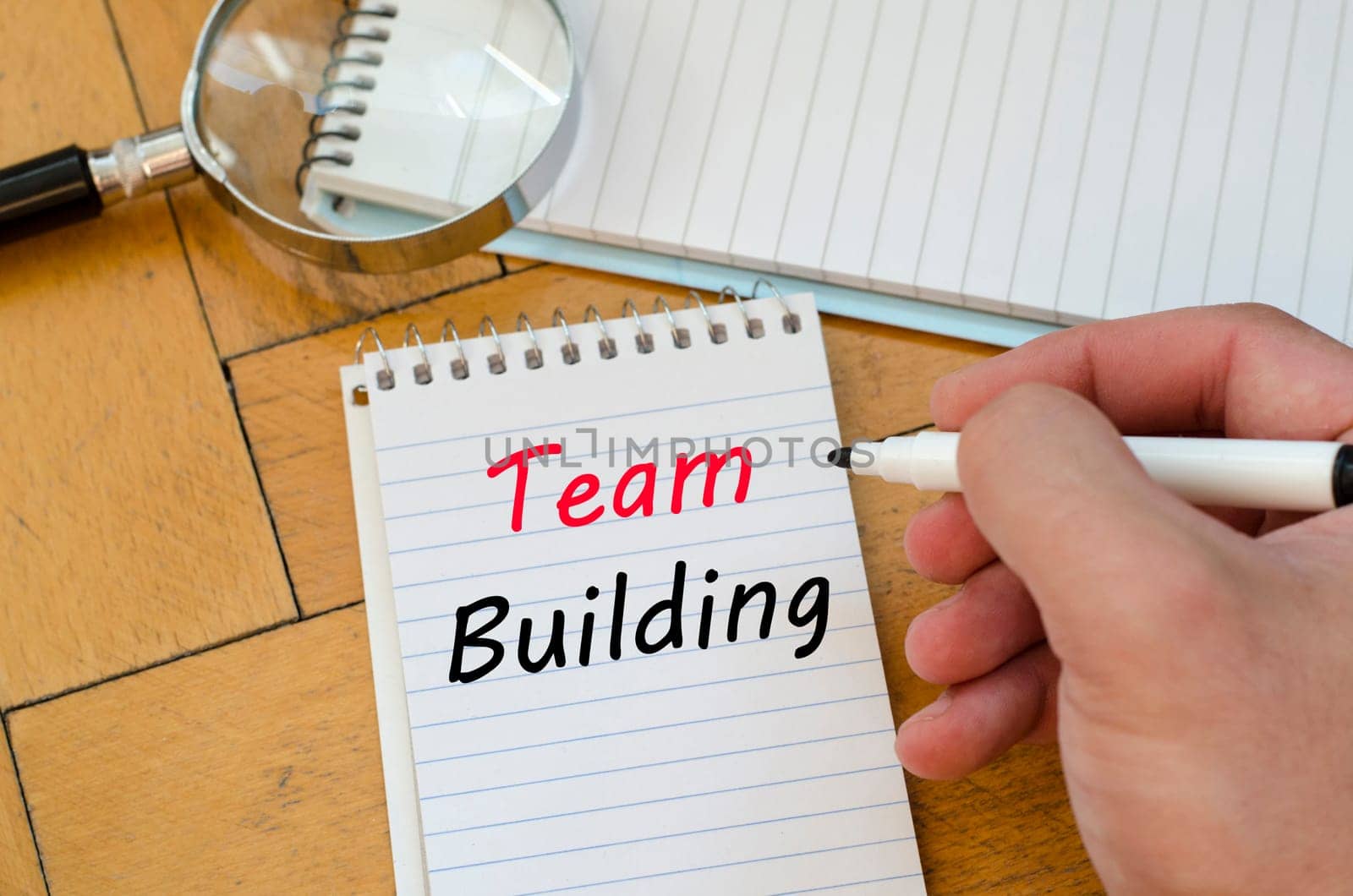 Team building text concept write on notebook