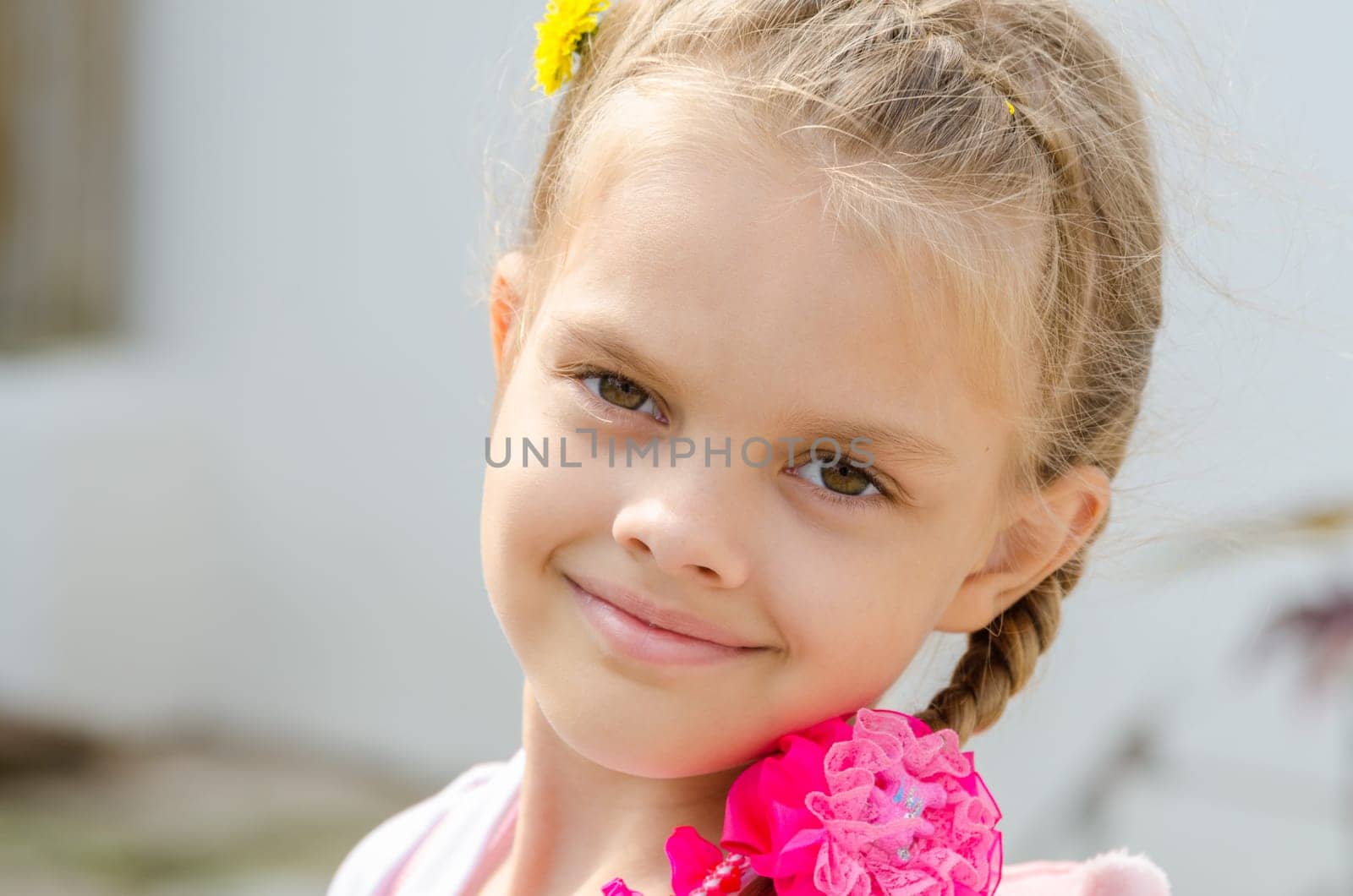 Close-up portrait of a beautiful six year old girl