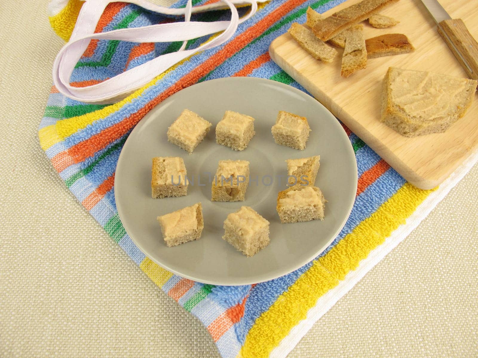Bread cubes with sausage as finger food for toddlers