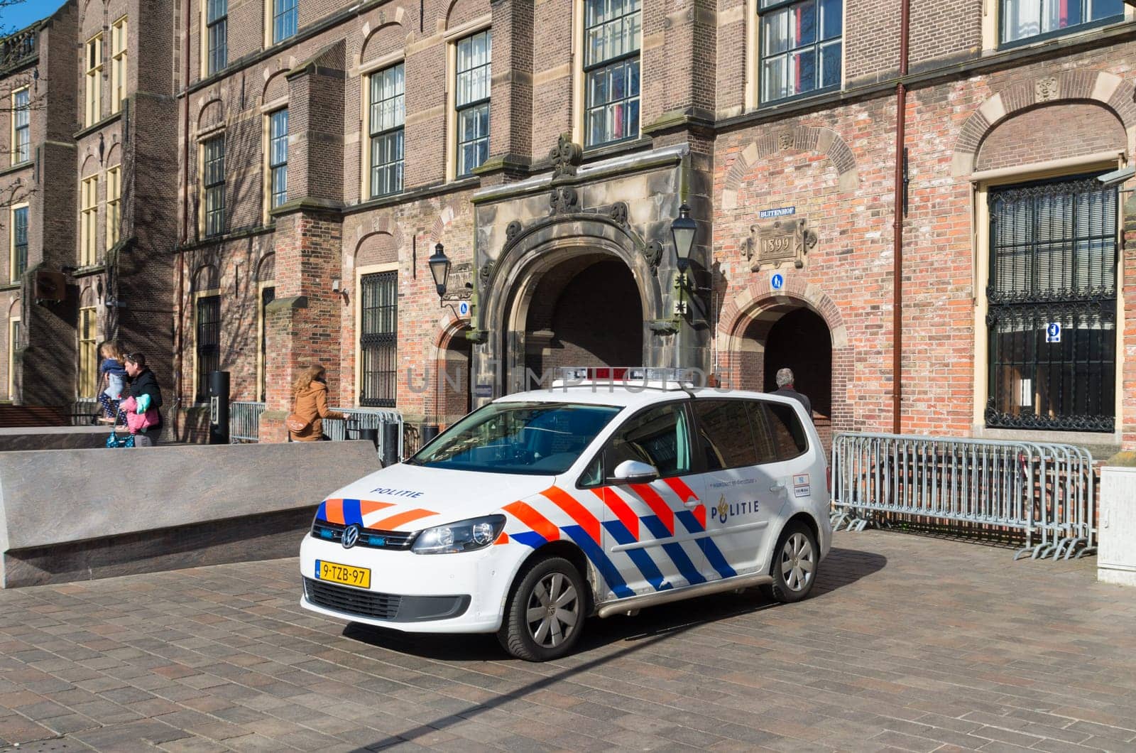 THE HAGUE, NETHERLANDS - MARCH 28, 2016: Police car in front of the Binnenhof, the settlement of the dutch parliament