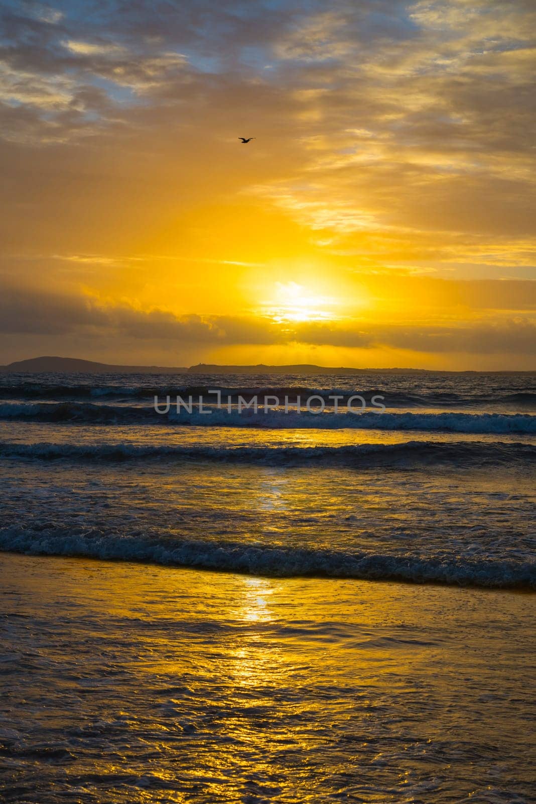 beal beach near ballybunion on the wild atlantic way ireland with a beautiful yellow sunset