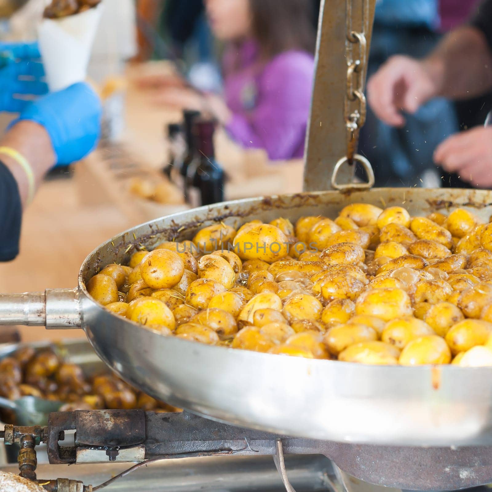New potatoes. Fried in a pan. Italian recipe: potatoes cooked to Salento. Selective focus.