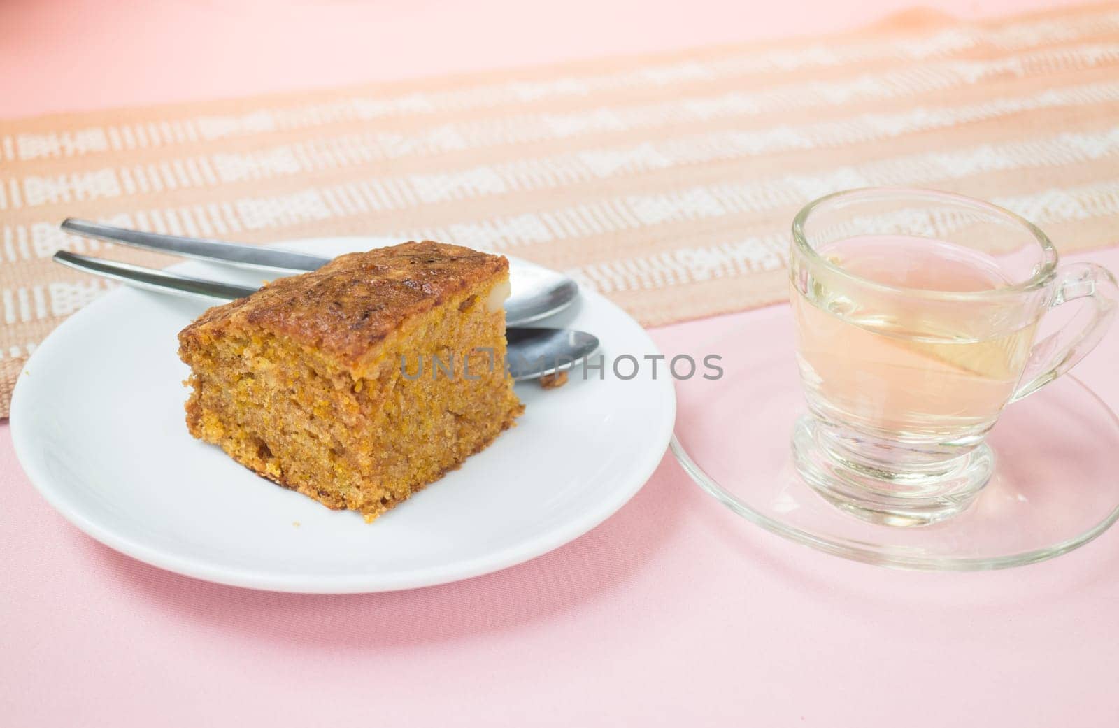 Hot tea and carrot cake, stock photo