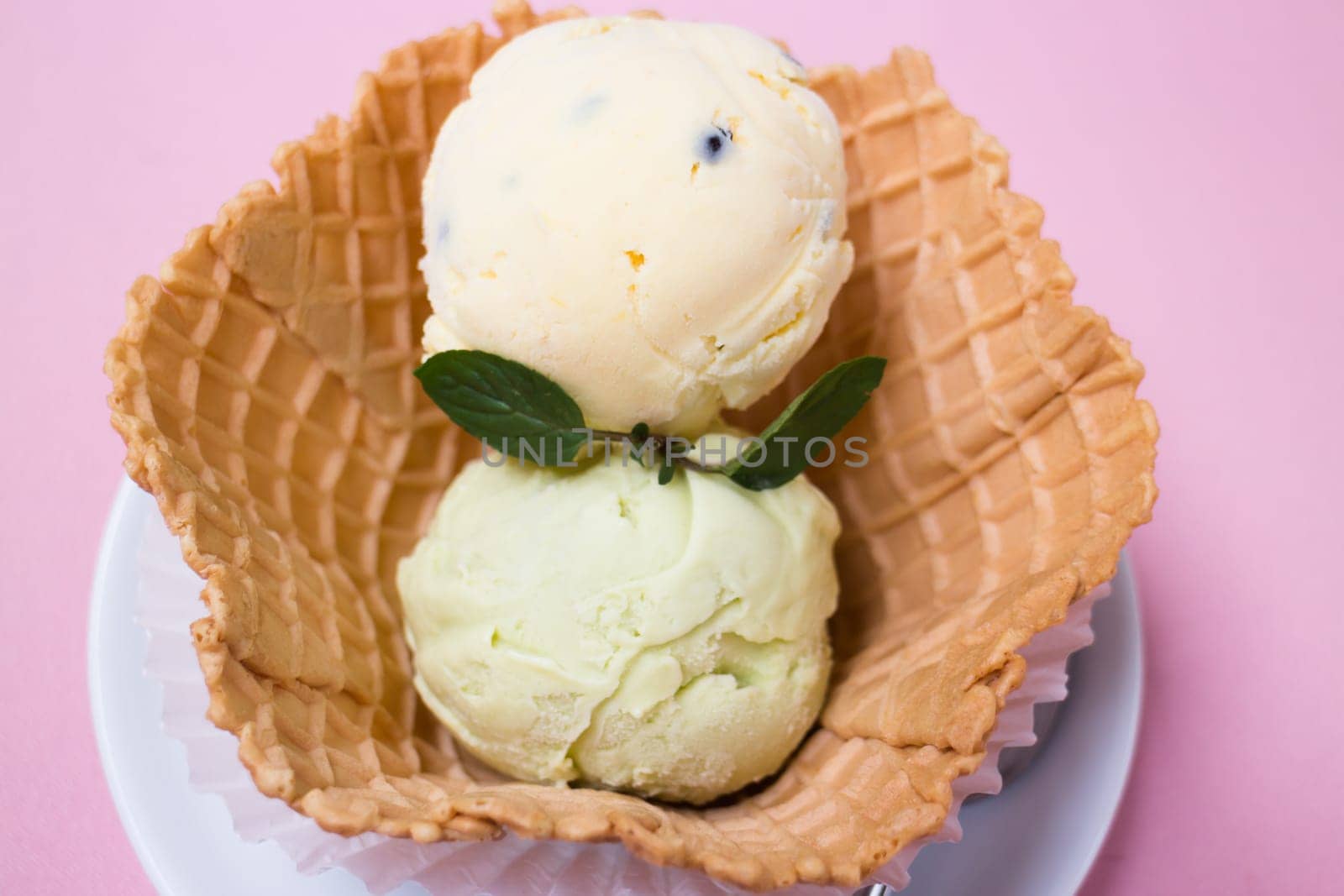 Homemade ice cream scoops in waffle bowl, stock photo