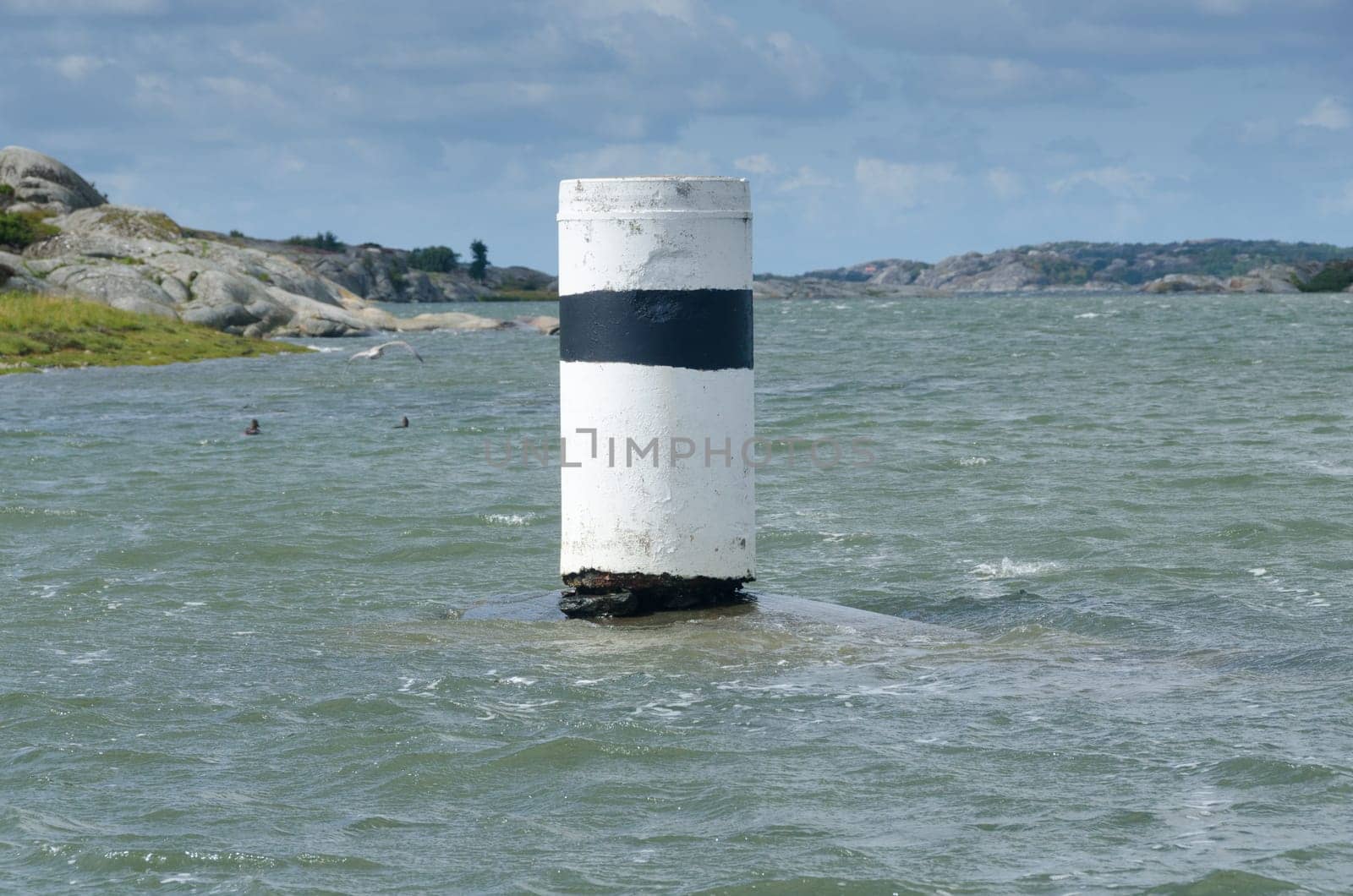 one navigation mark in the water to help to drive the boat safe