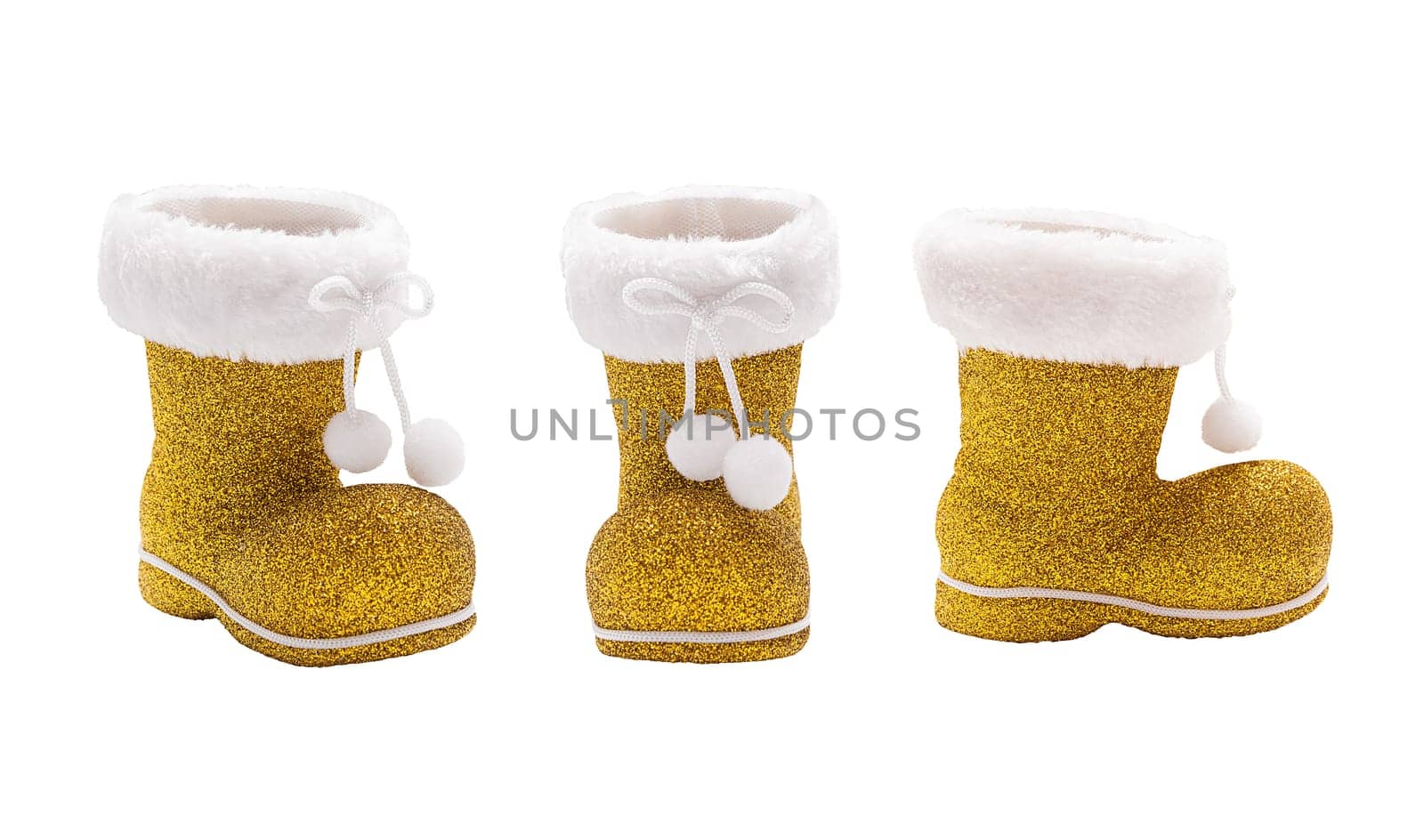 Set of empty golden boots of Santa Claus isolated