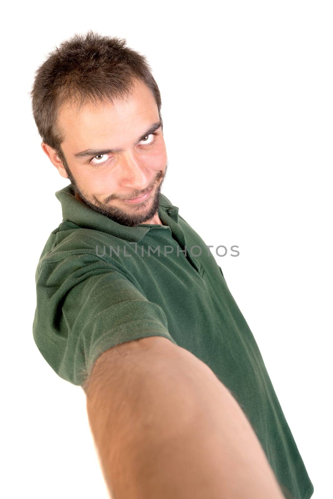 Young man taking a selfie isolated in white