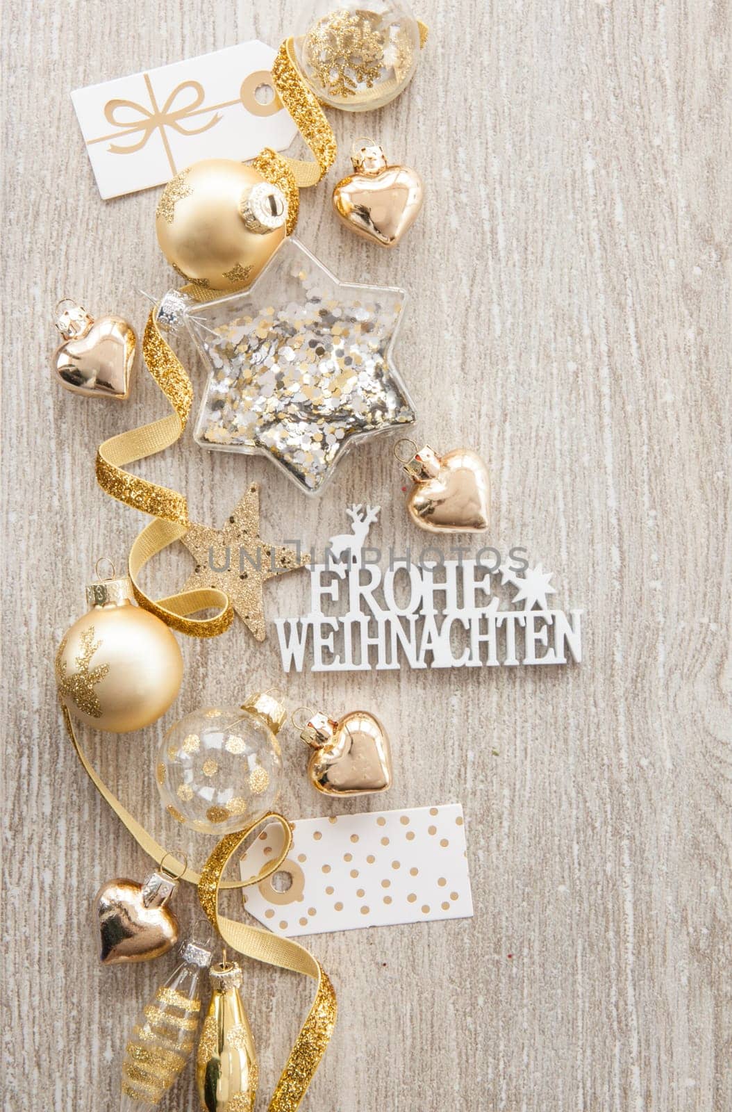 Christmas baubles and other decorations for Christmas on a wooden background