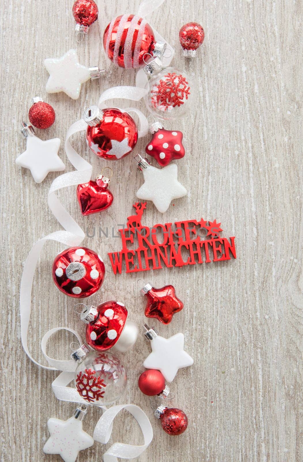Christmas baubles and other decorations for Christmas on a wooden background