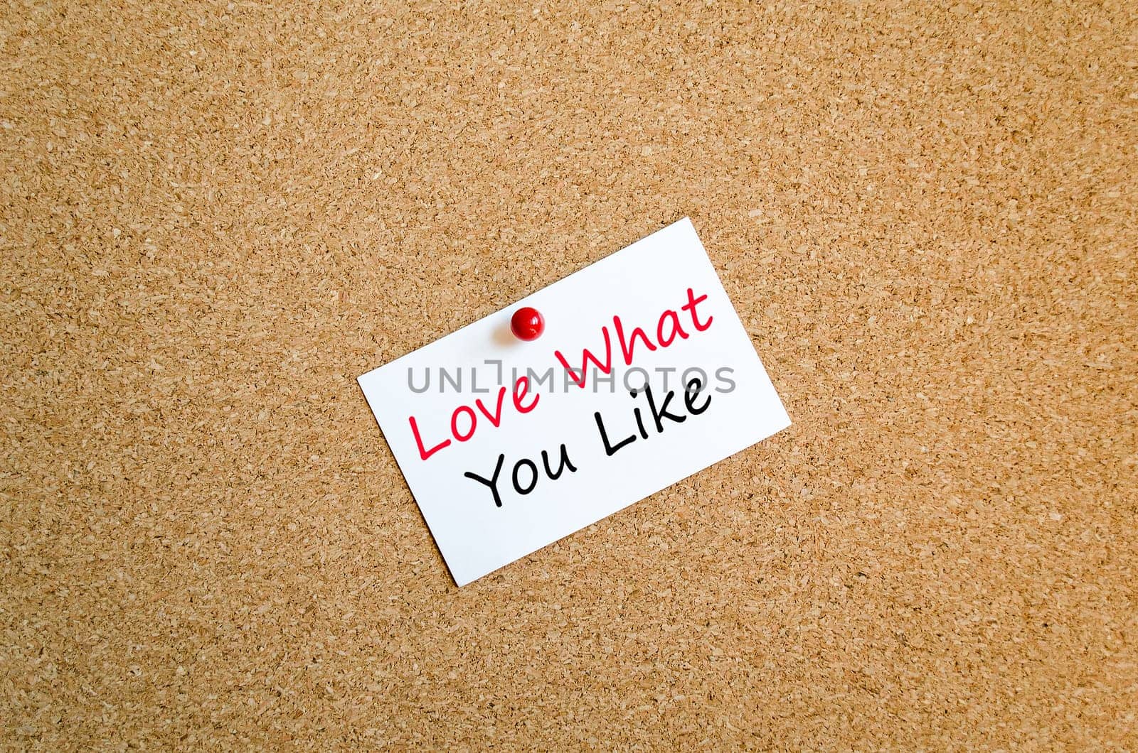 Sticky note on cork board background and text concept