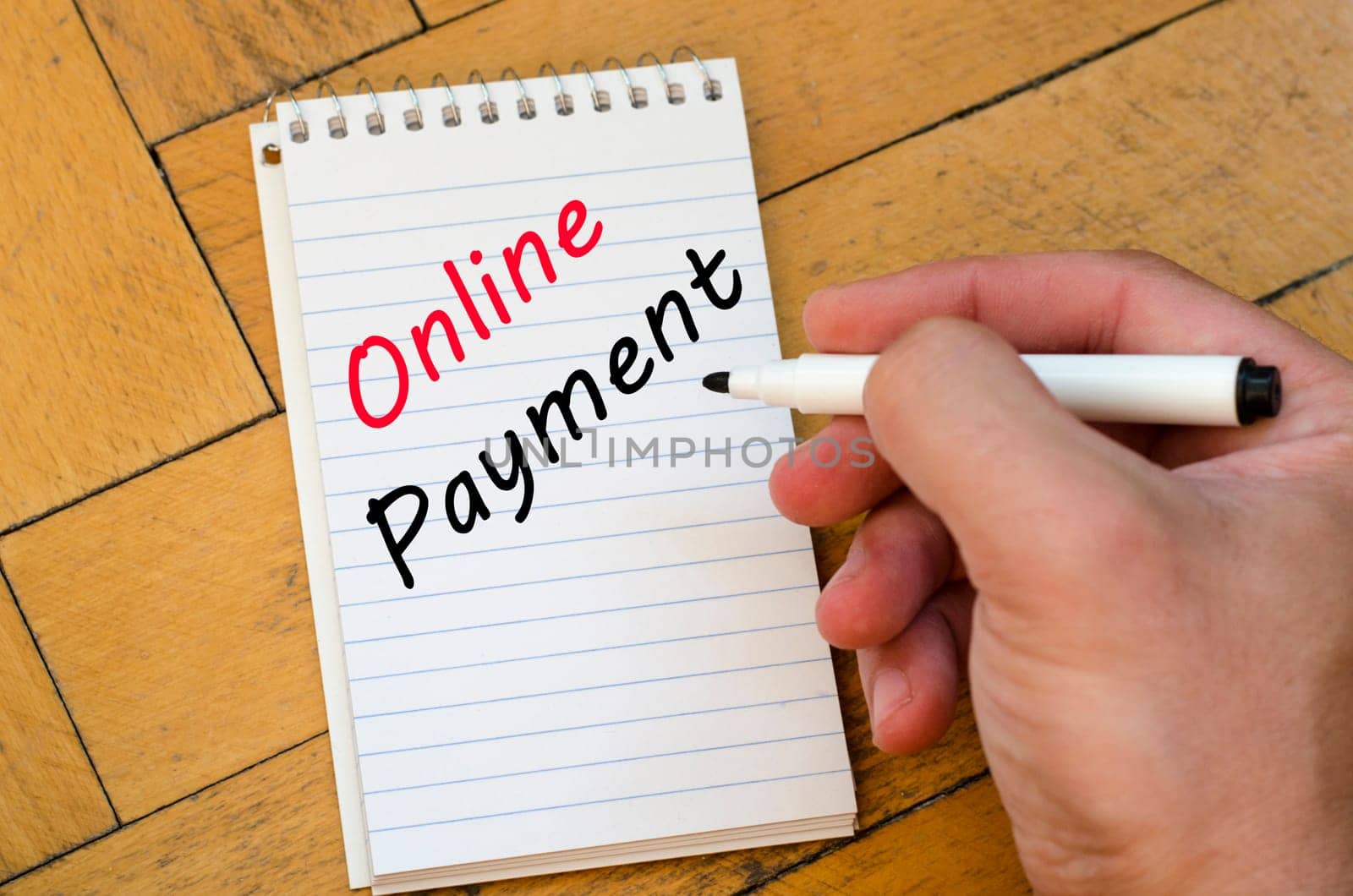 Online payment text concept write on notebook