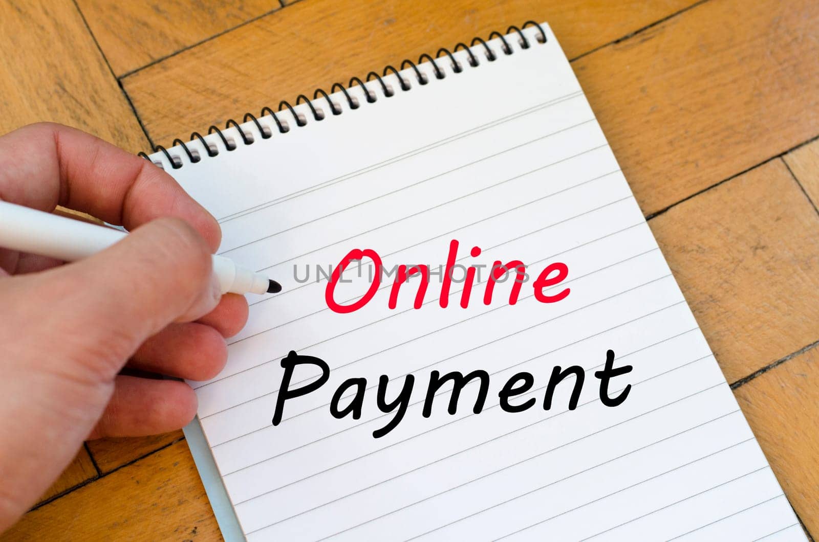 Online payment text concept write on notebook