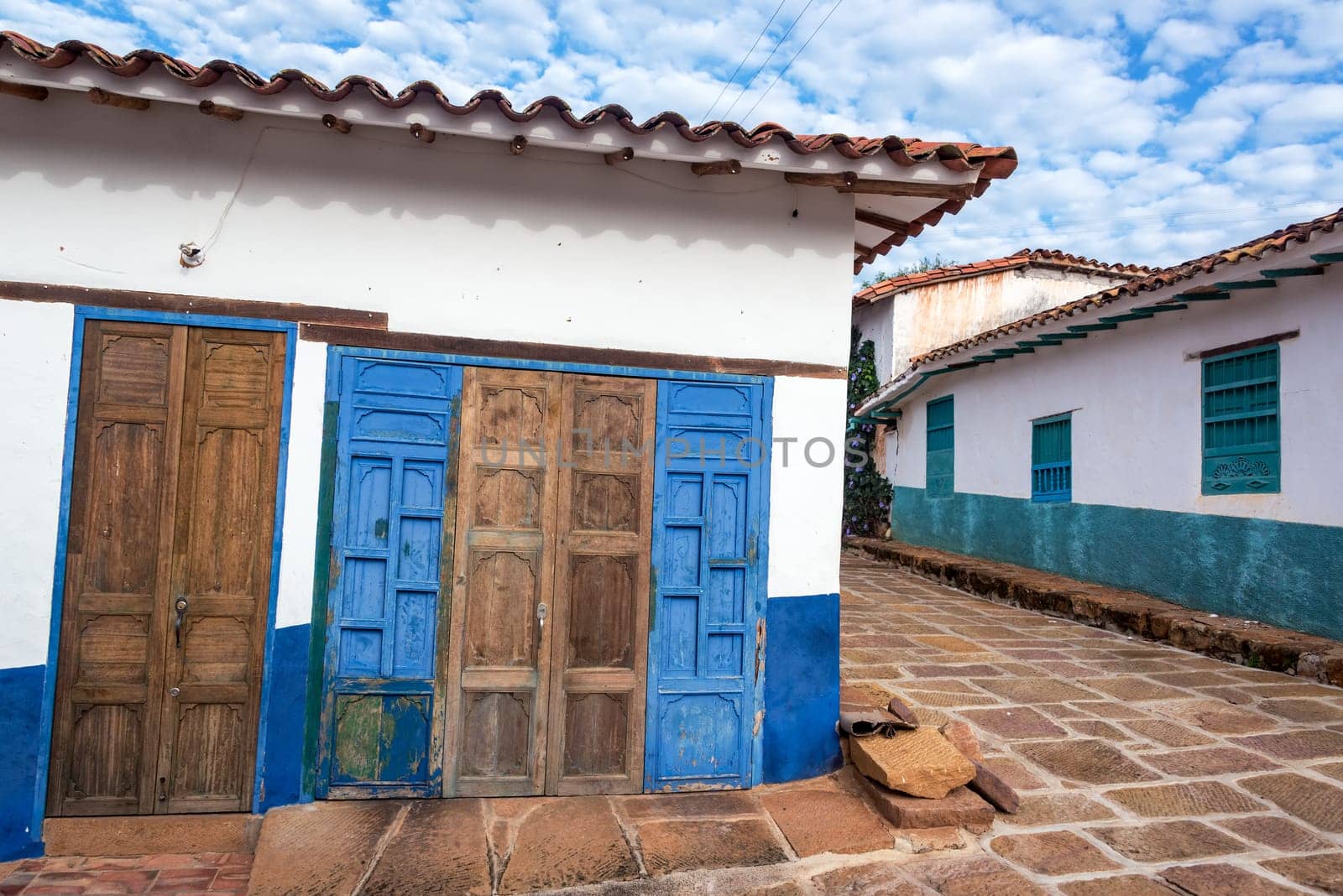 Old rustic doors and colonial architecture in the colonial town of Barichara, Colombia