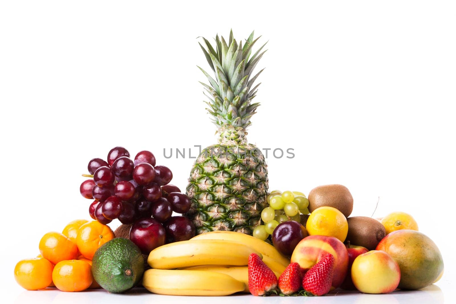 Fresh fruits.  Assortment of exotic fruits isolated on white