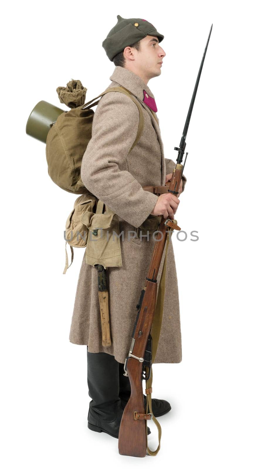 young Soviet soldier with  winter uniform isolated on the white background