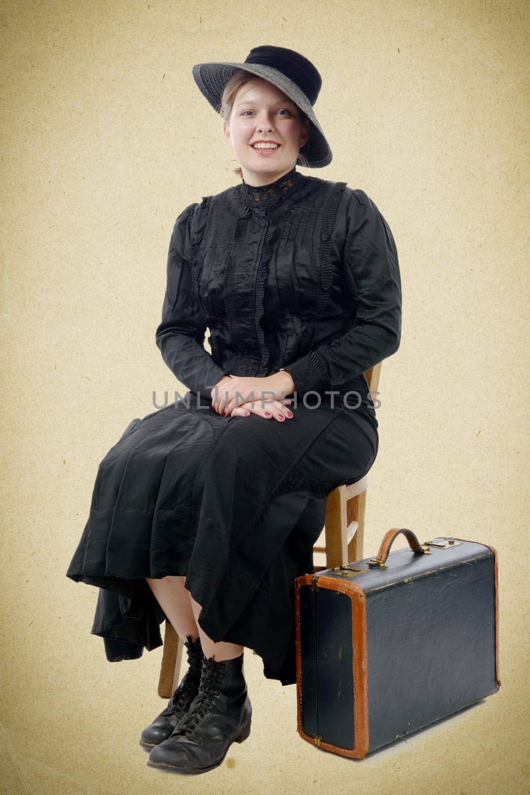 young woman in vintage costume 1900's