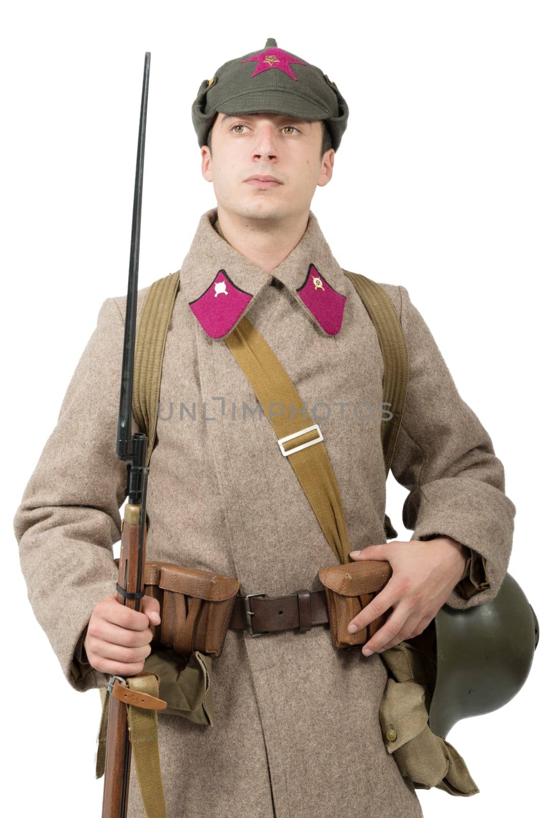 young Soviet soldier with  winter uniform isolated on the white background