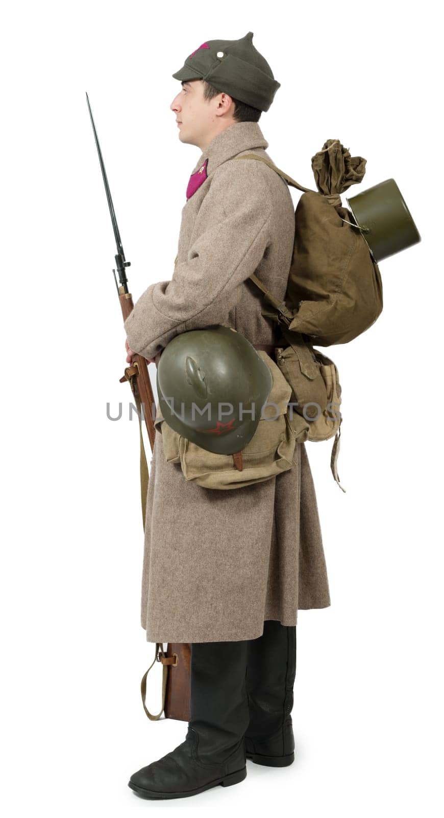 young Soviet soldier with  winter uniform isolated on the white background