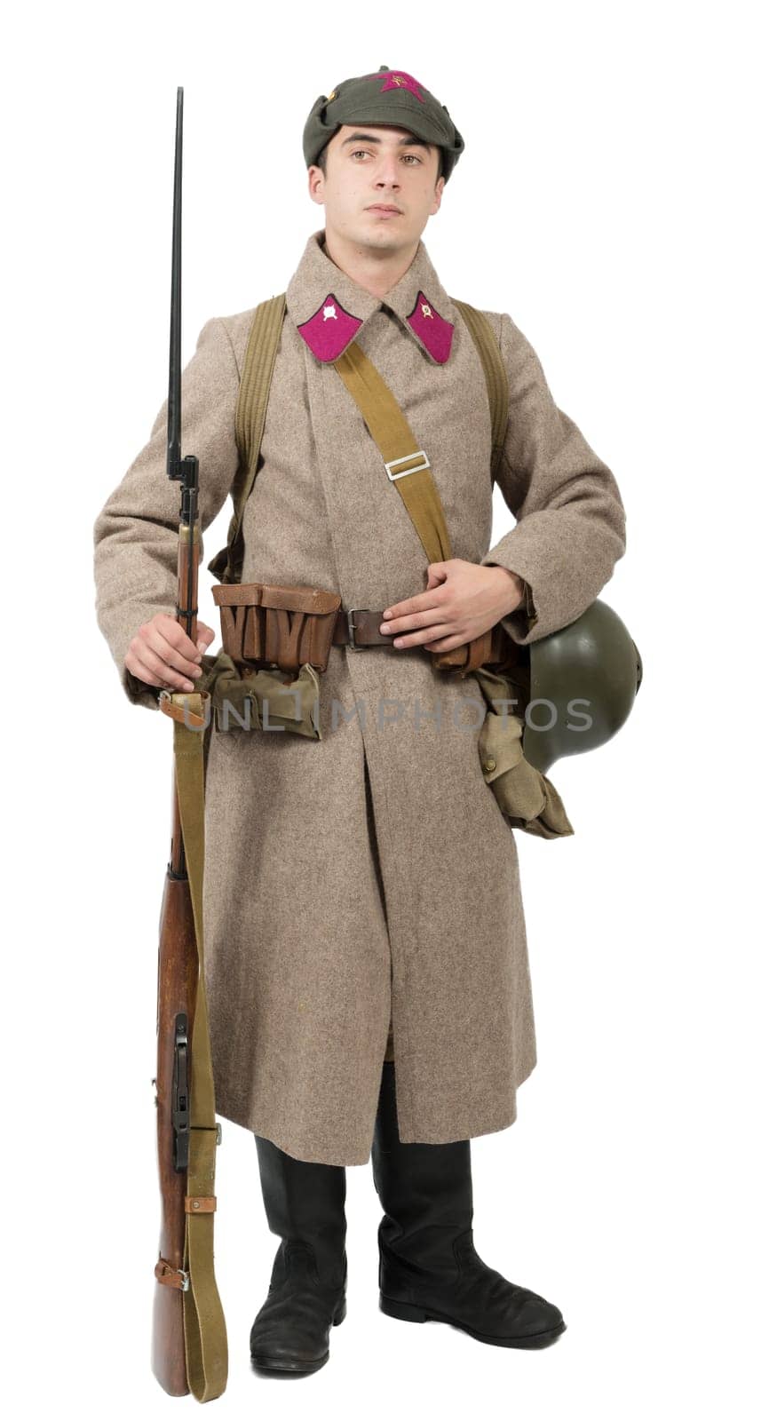 young Soviet soldier with  winter uniform isolated on the white background