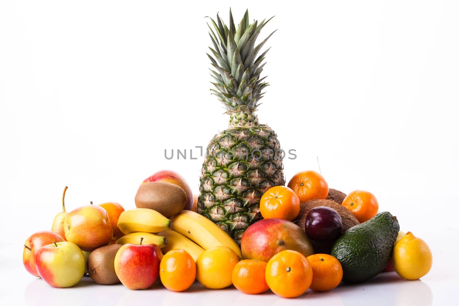 Fresh fruits.  Assortment of exotic fruits isolated on white