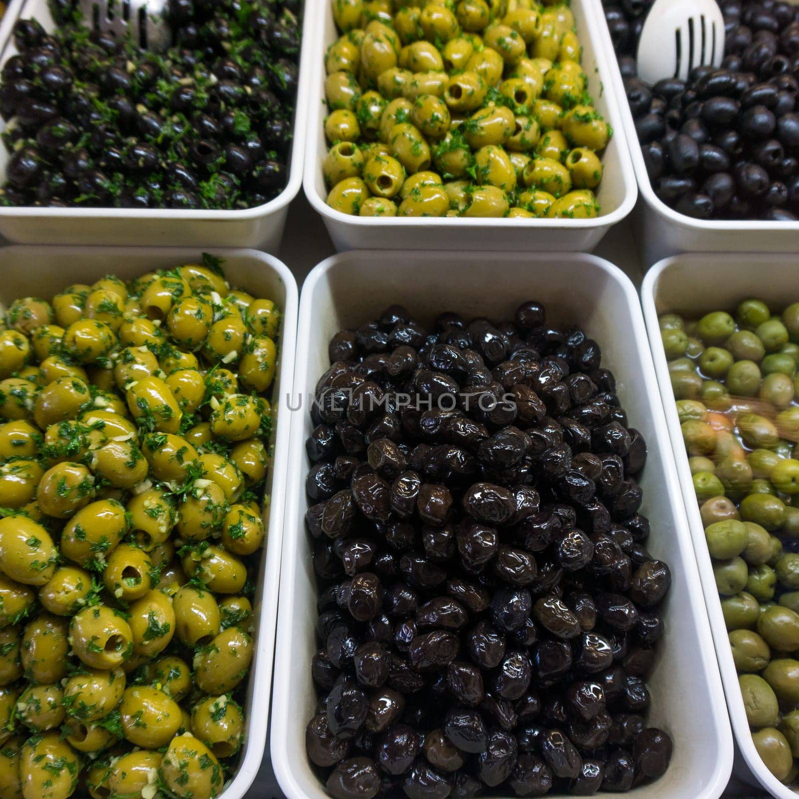 various olives for sale at a market