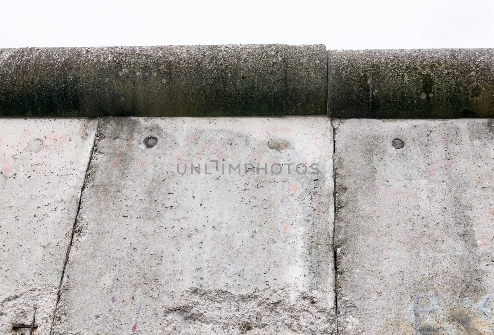 A look up towards the high gray wall