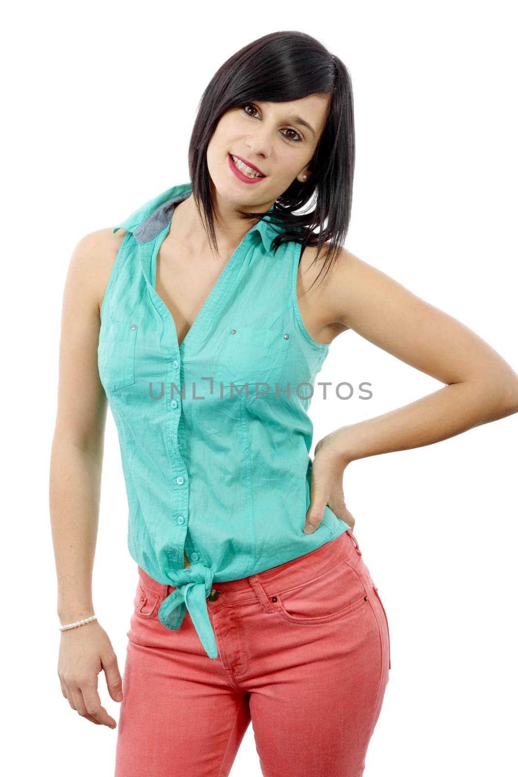 young brunette girl with a green shirt and pink pants