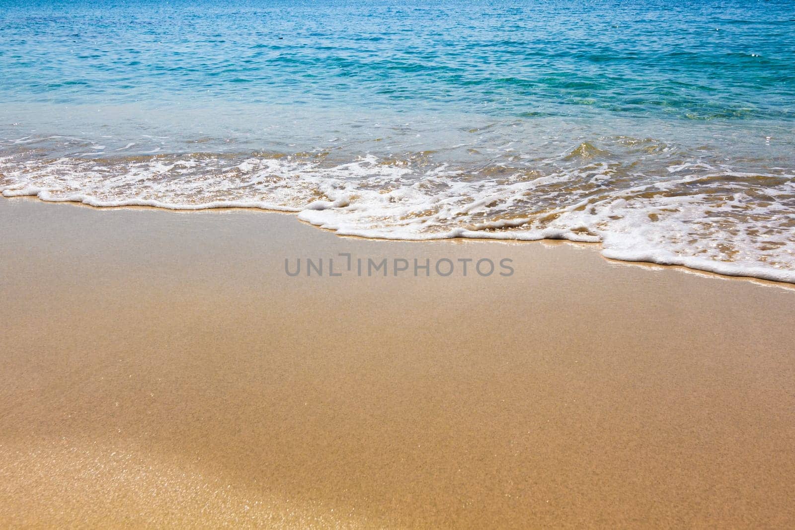 Blue Ocean Wave On Sandy Beach. Sand beach and tropical sea