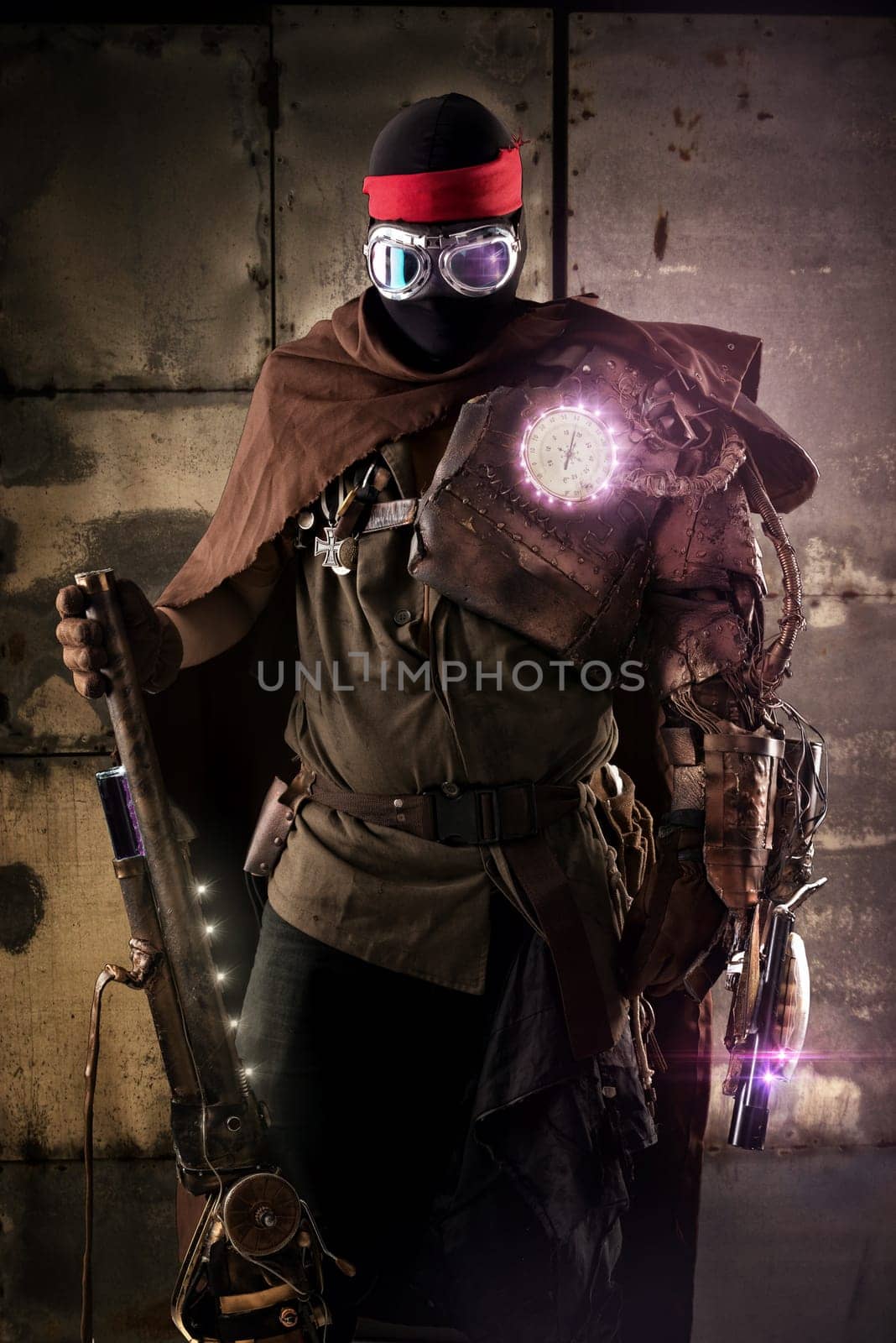 Futuristic soldier posing with gun and armor