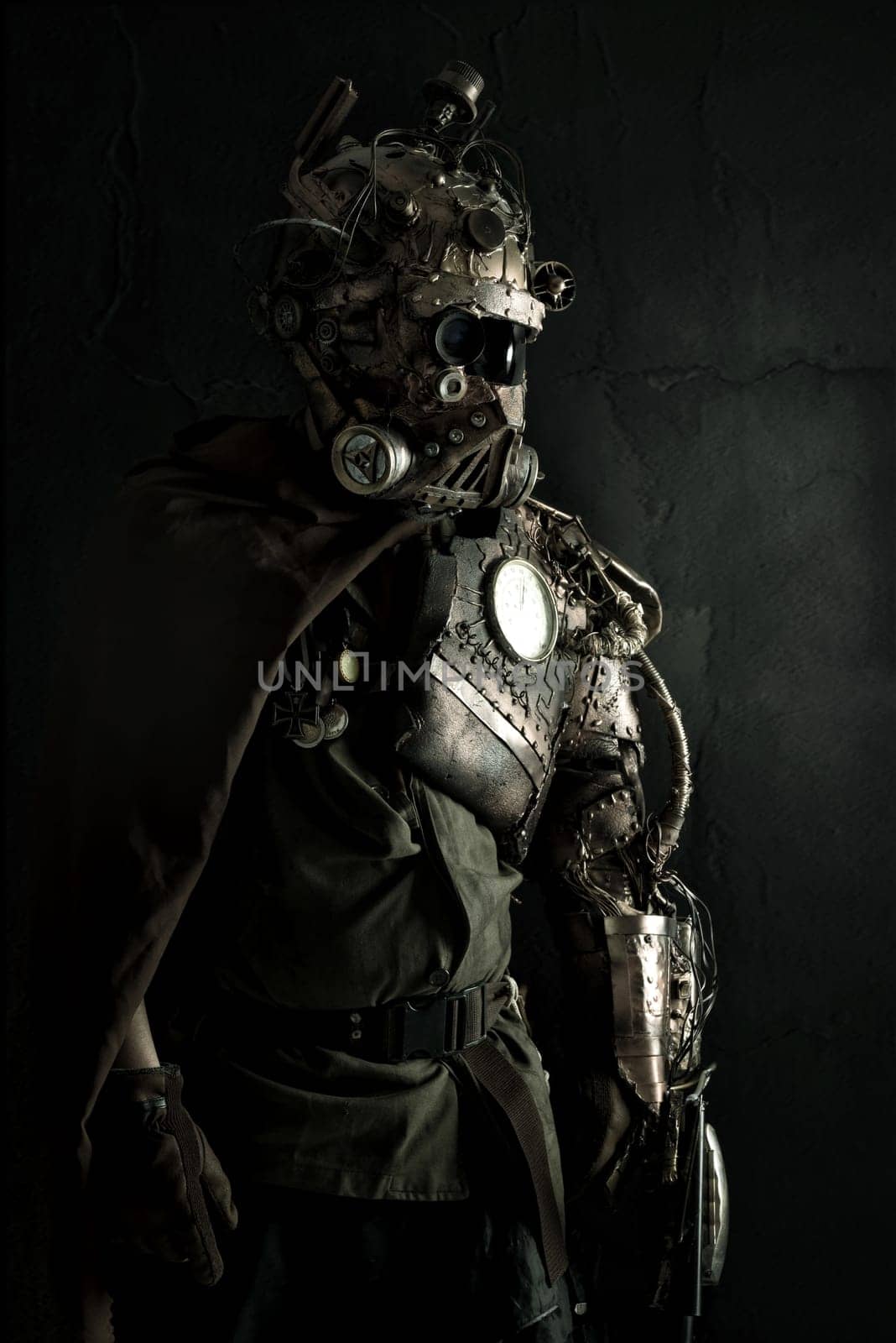 Futuristic soldier posing with gun and armor