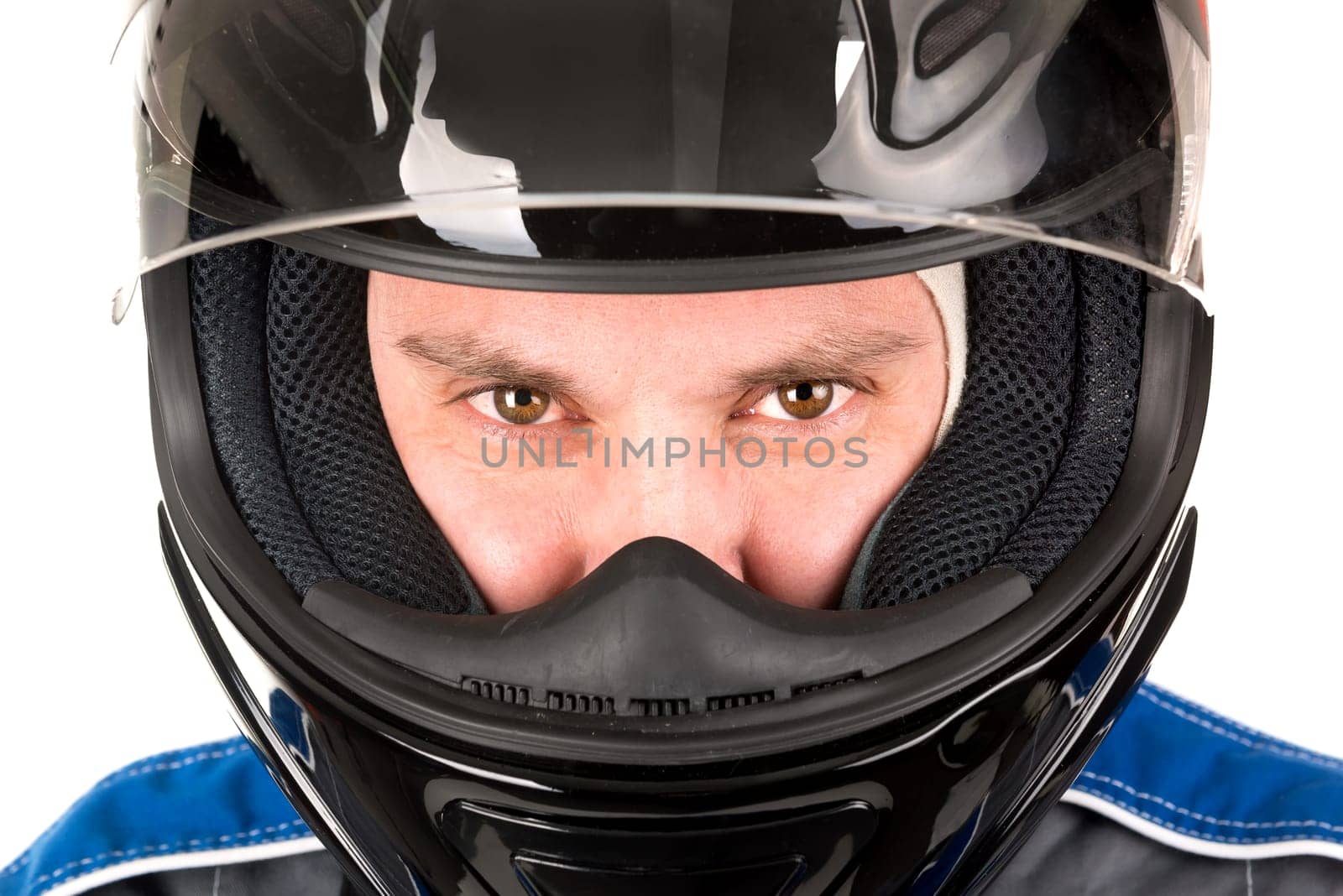 Racing driver head with helmet isolated in white