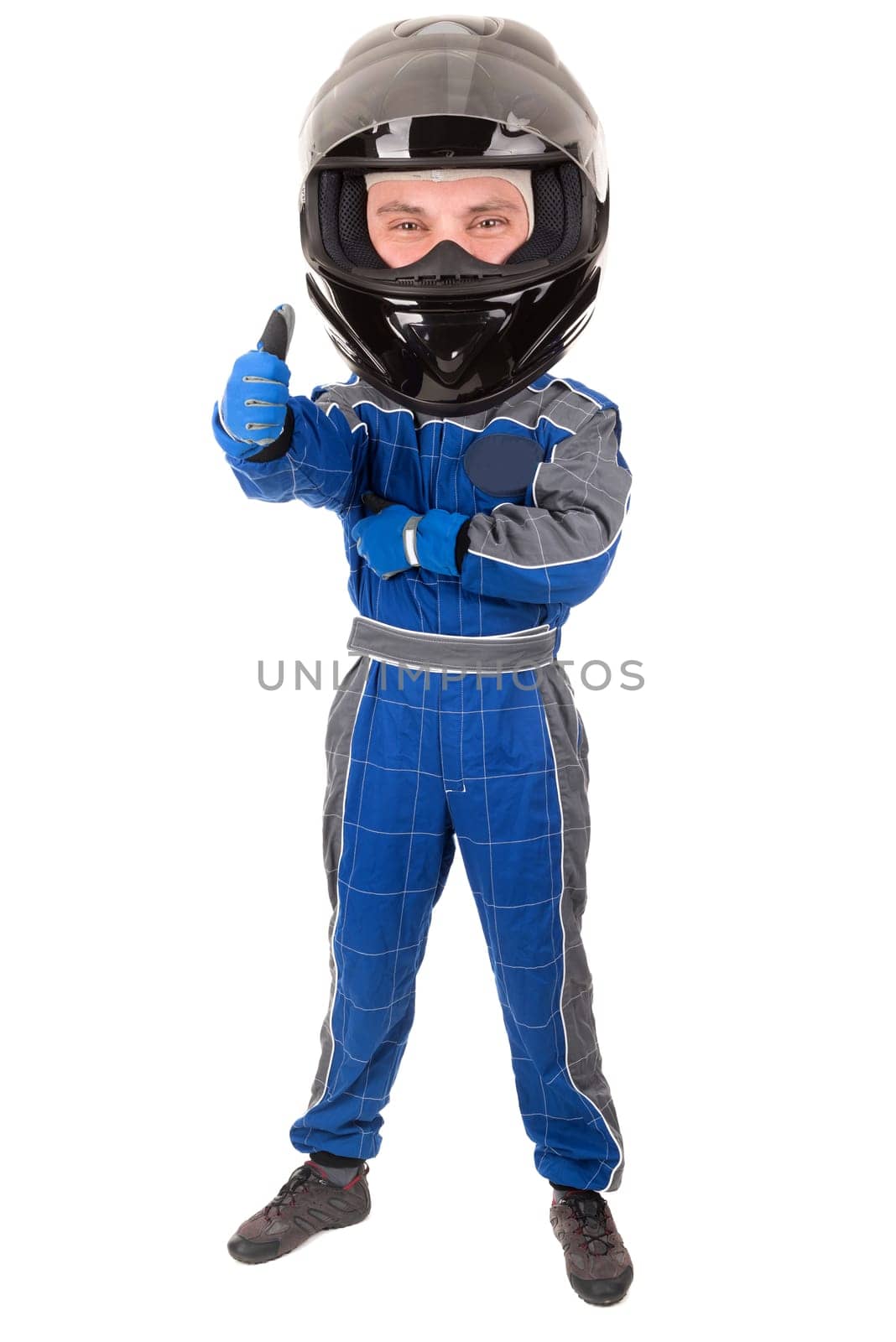 Racing driver with big head posing with helmet isolated in white