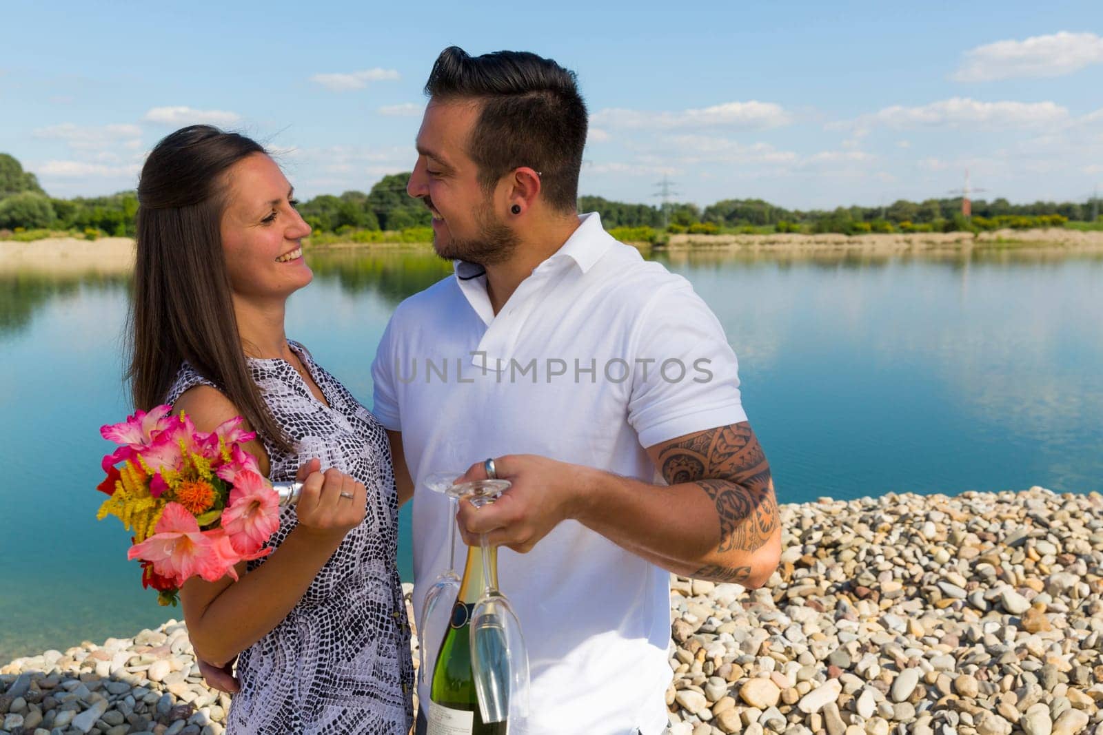 Happy young couple with champagne glasses,engagement,Bavaria,Germany