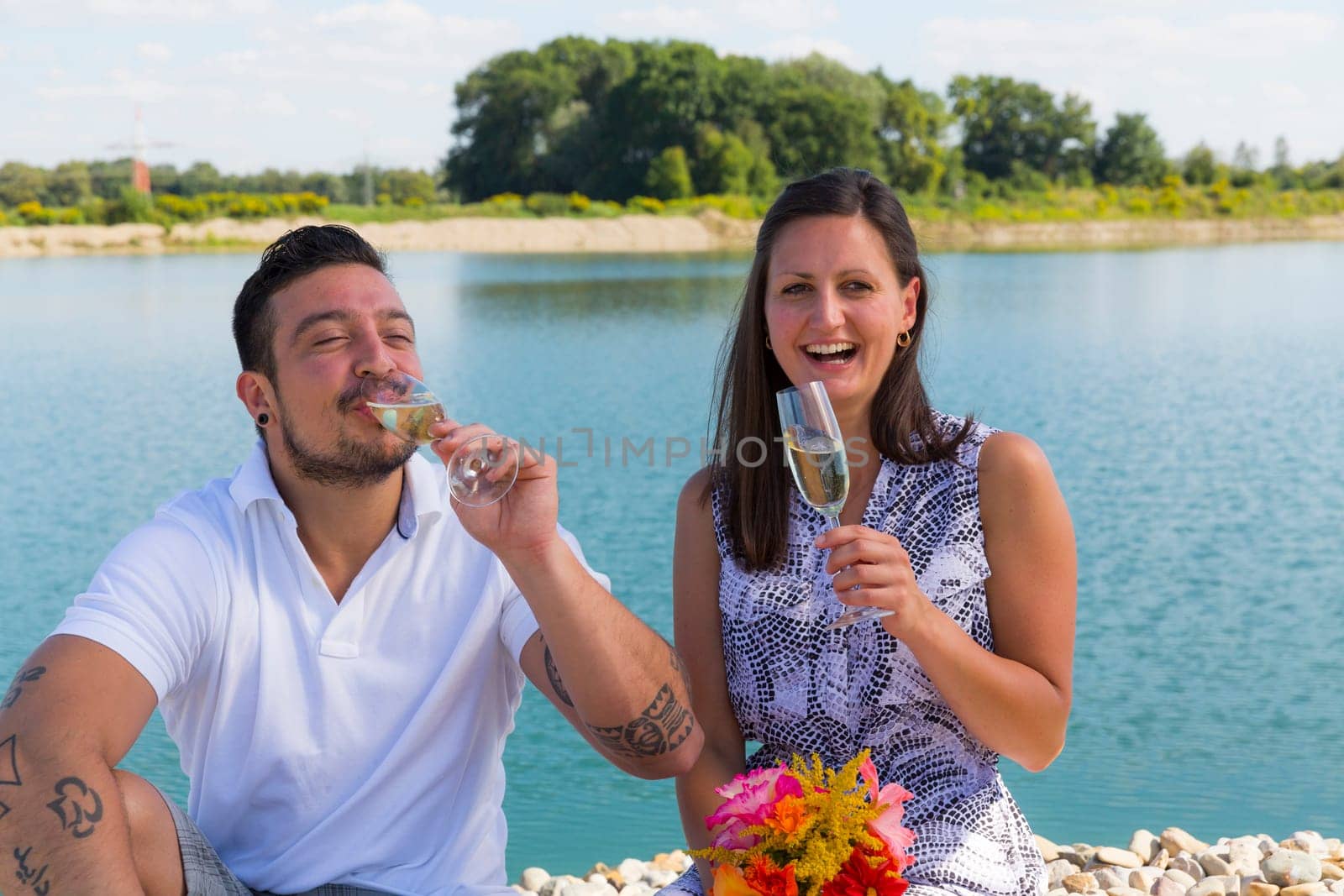 Happy young couple with champagne glasses,engagement,Bavaria,Germany