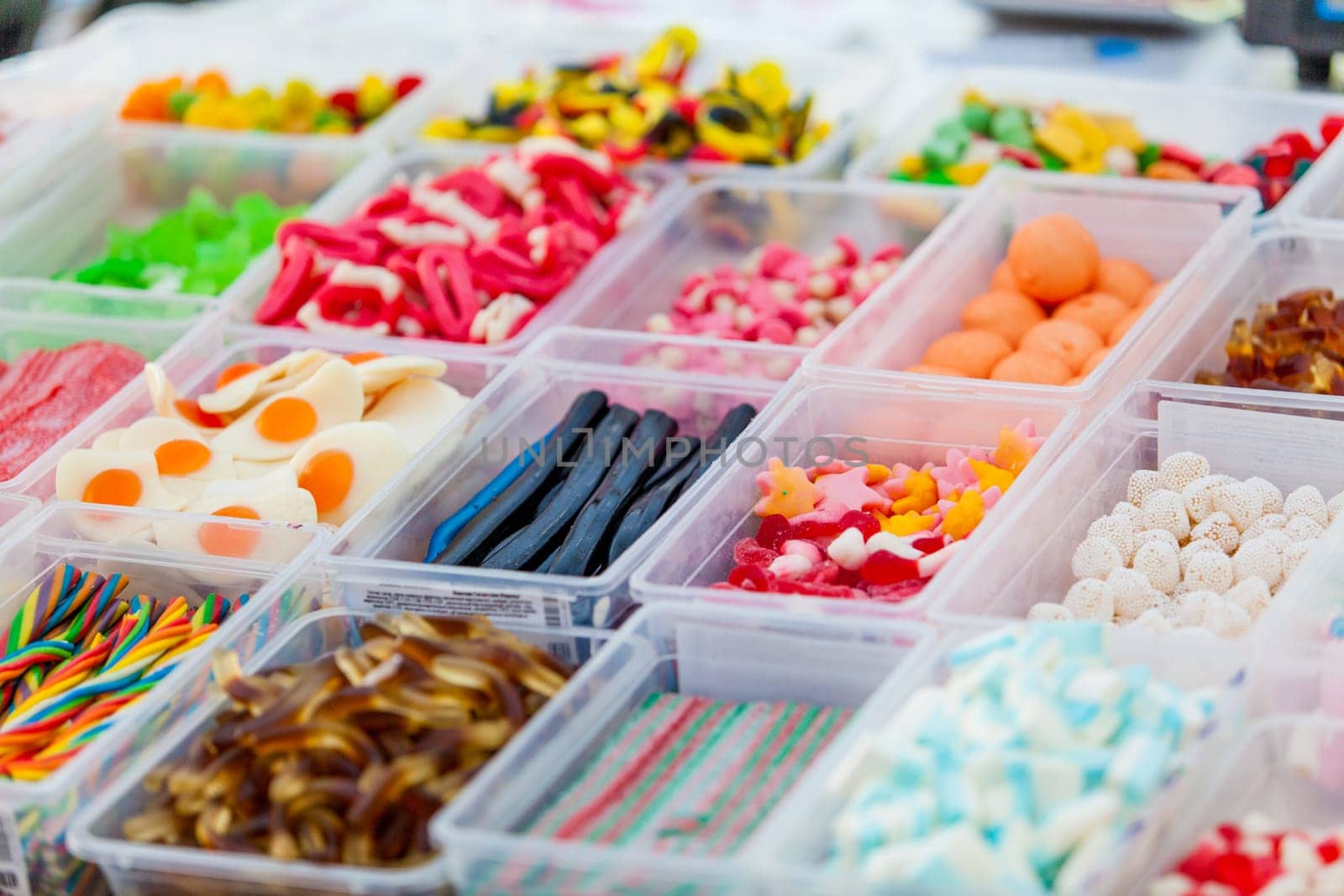 Assorted candy in a market. colorful candies and jellies