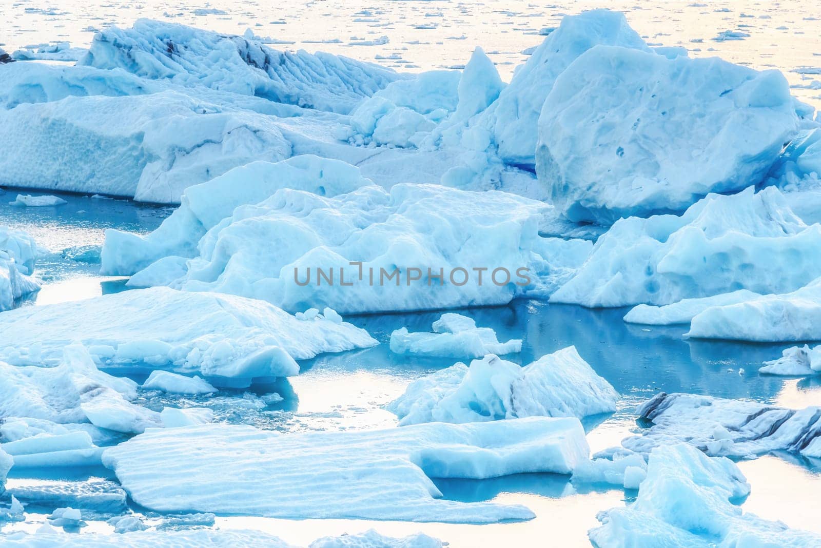 Scenic view of icebergs in Jokulsarlon glacier lagoon, Iceland, selective focus, global warming concept