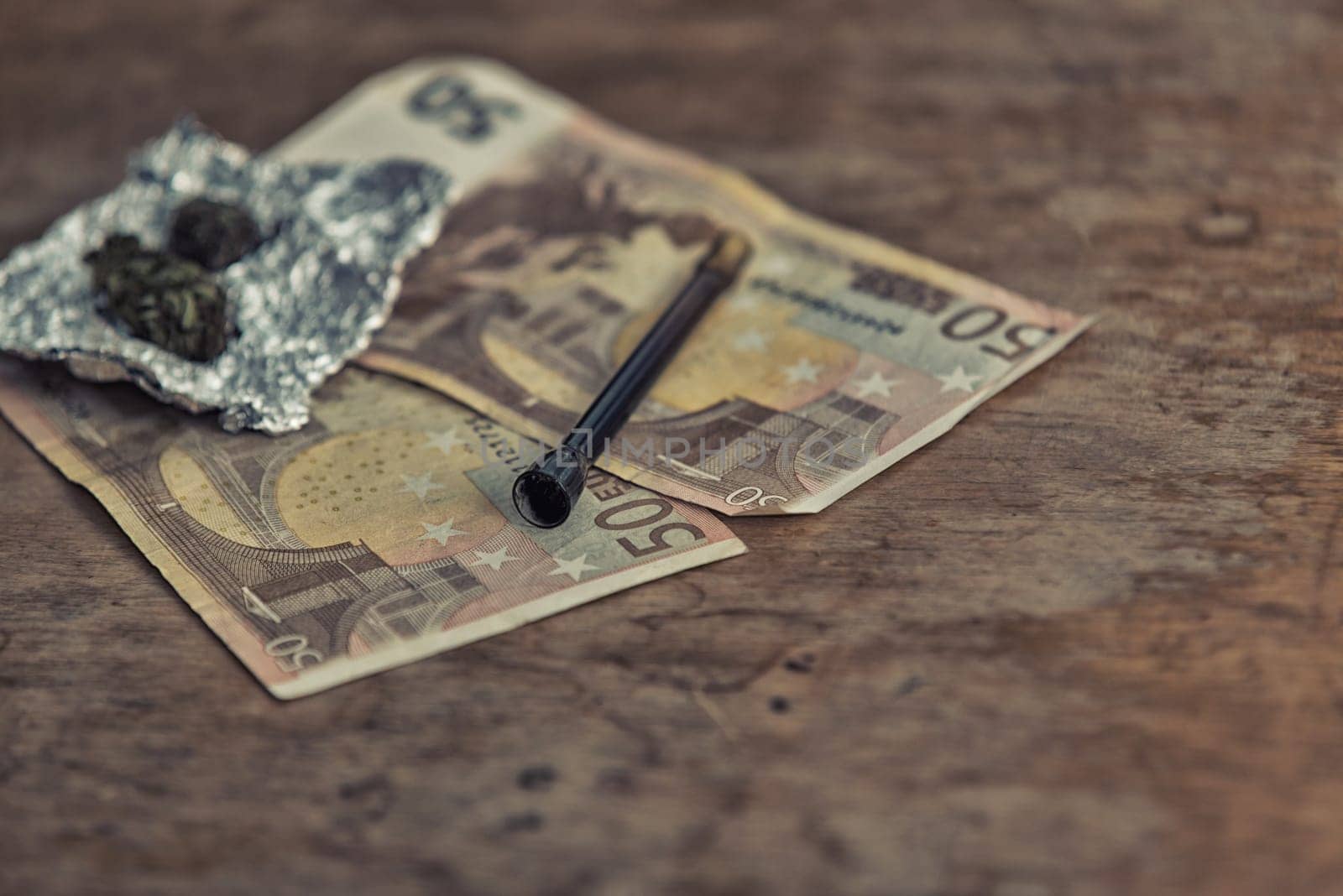 close up of marijuana,pipe and euro money,vintage effect