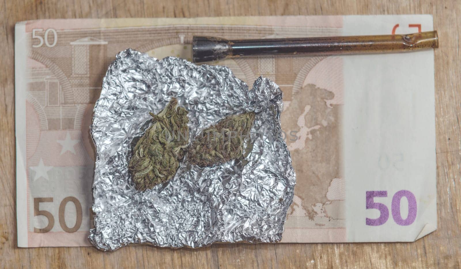 close up of marijuana,pipe and euro money,vintage effect