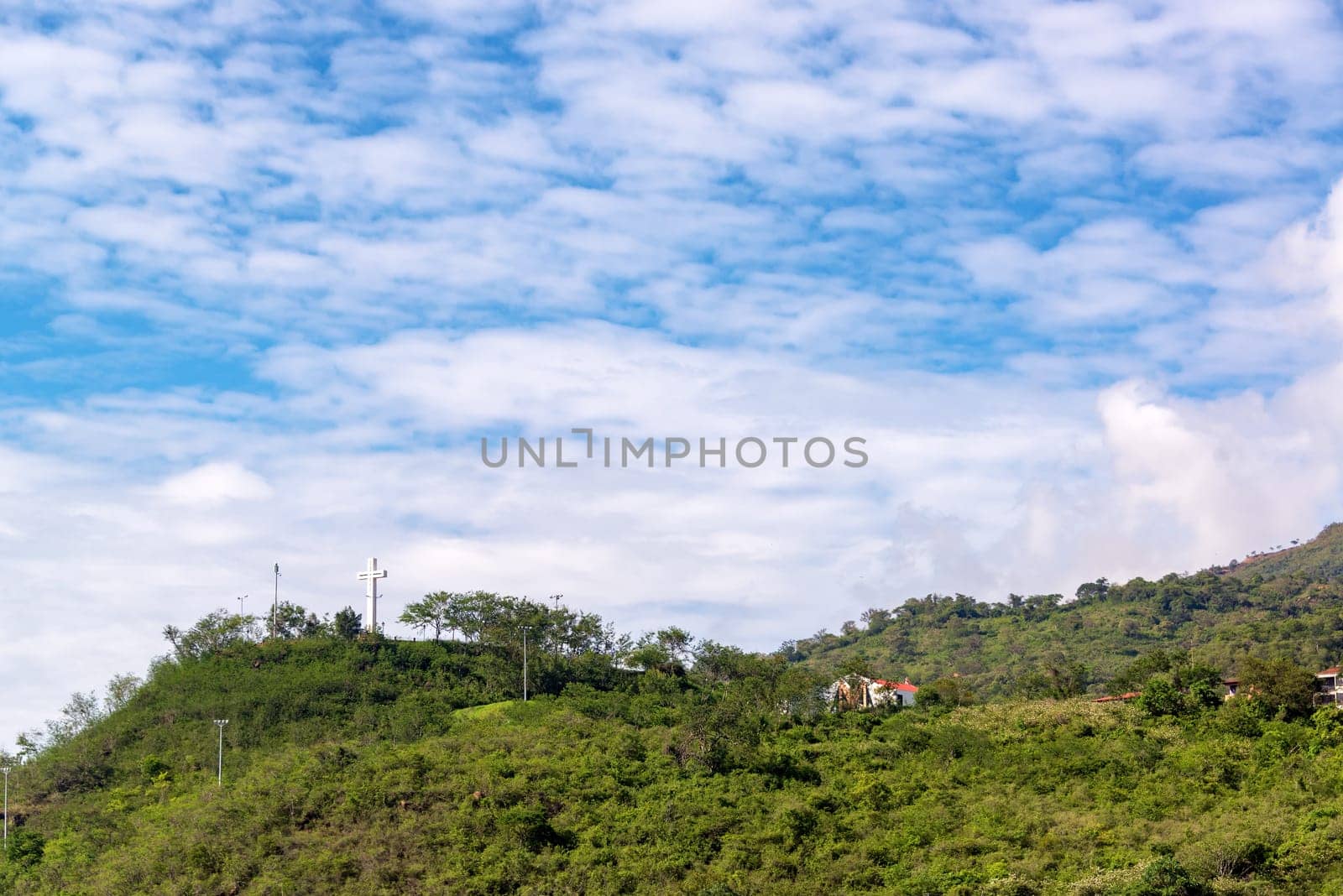 Large white cross on a hill overlooking San Gil, Colombia