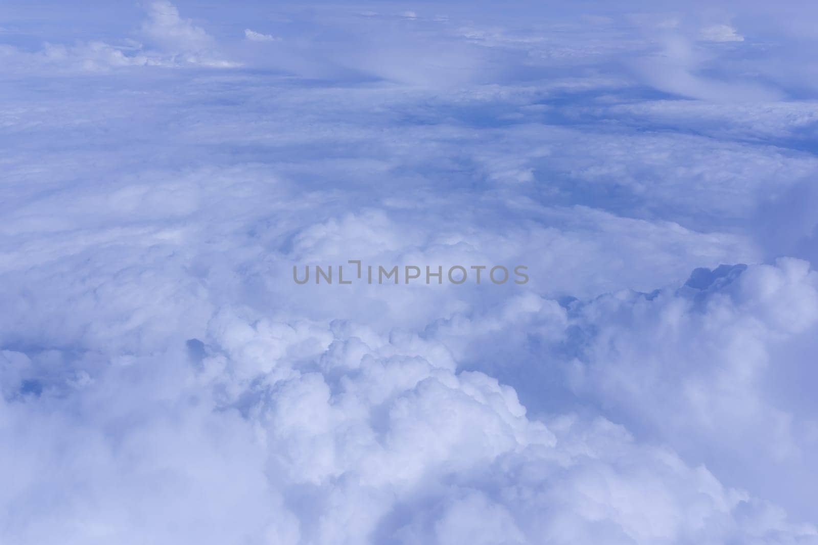 Sky clouds.  Over the Clouds.  Cloudscape. Blue sky and white cloud. Cumulus cloud
