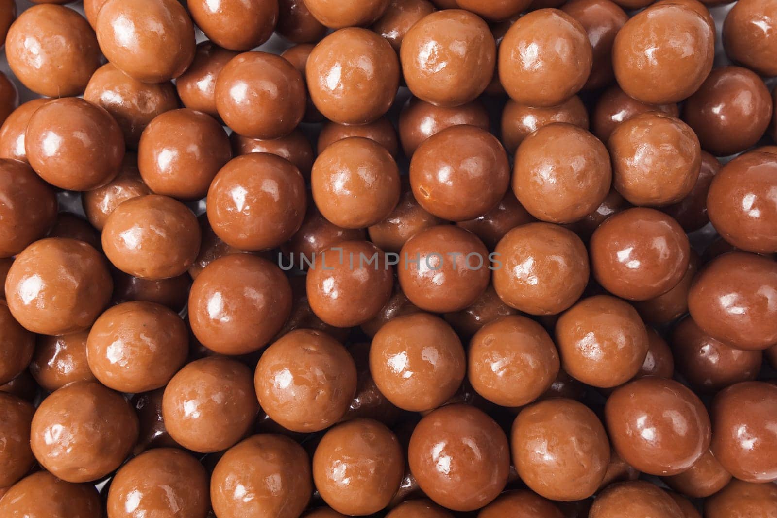Chocolate candies  background.  Closeup brown chocolate candy background