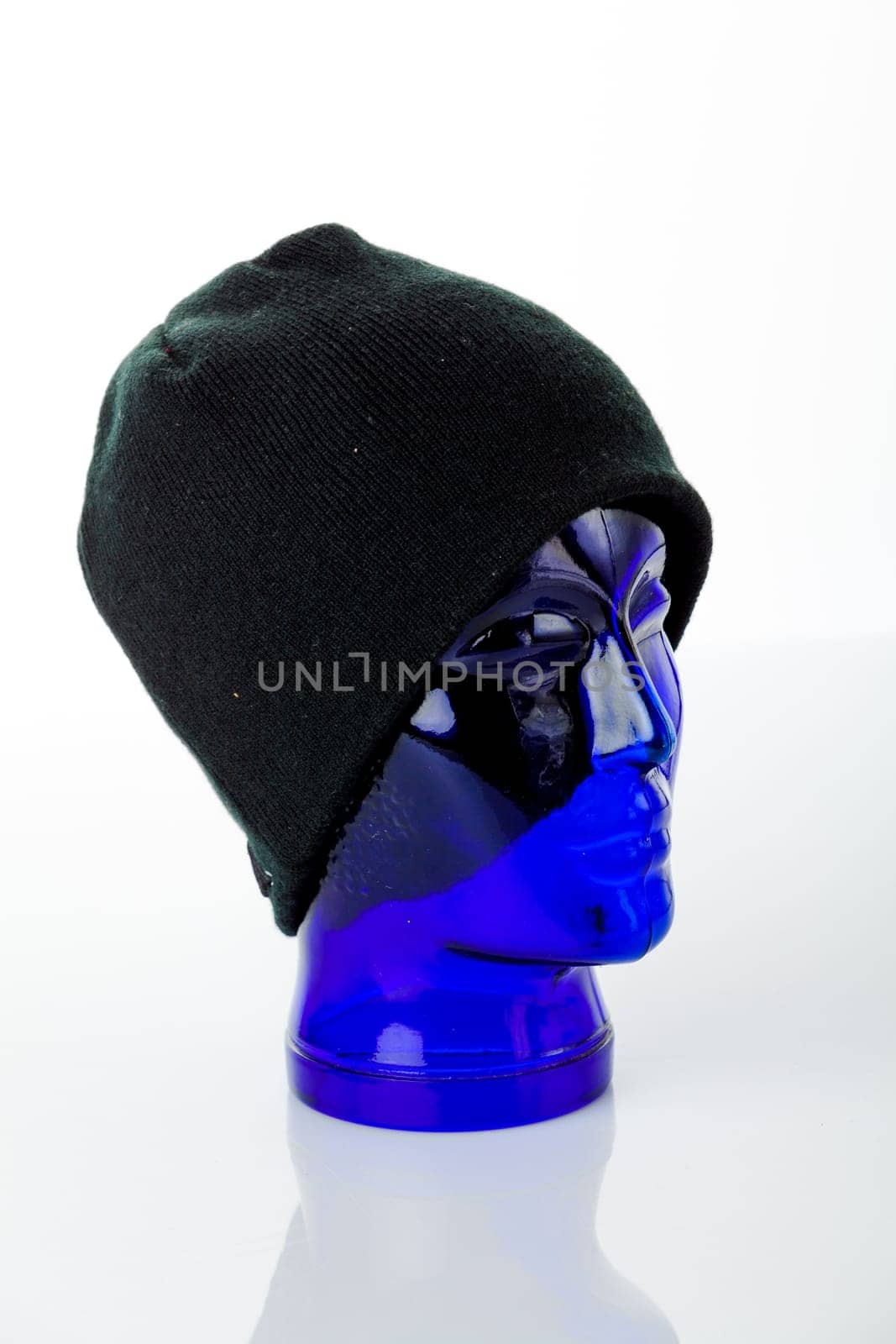 Wool knitted winter hat isolated on white background