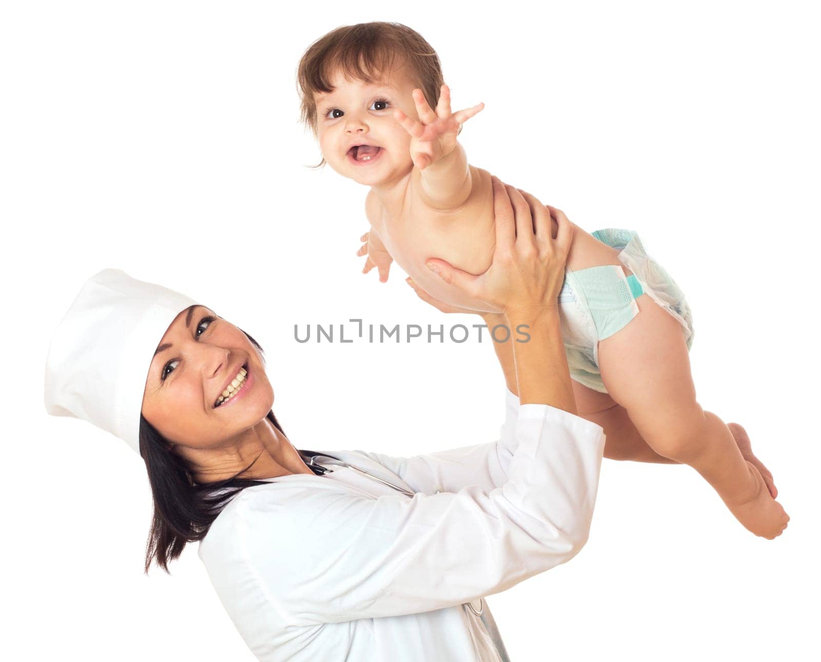 Doctor holding baby over his head. Isolated on white.