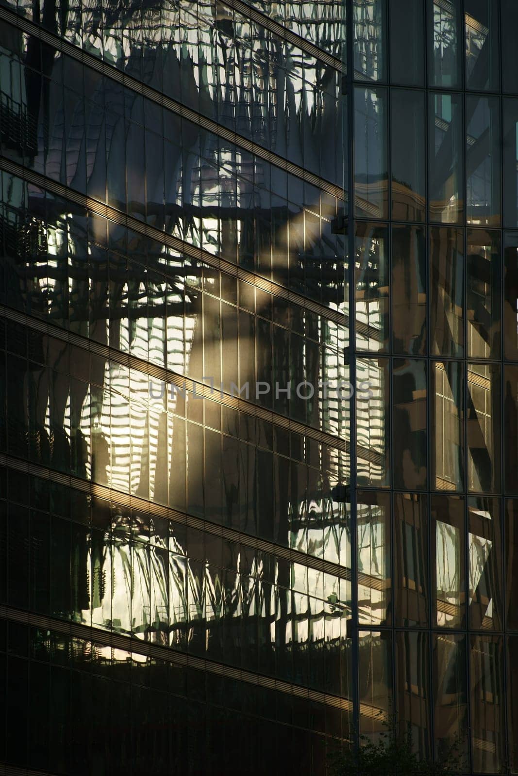 Berlin,Germany - May 10,2016: The modern glass façade of the Sony Center at Potsdamer Platz with swiveling mirror windows on May 10,2016 in Berlin.