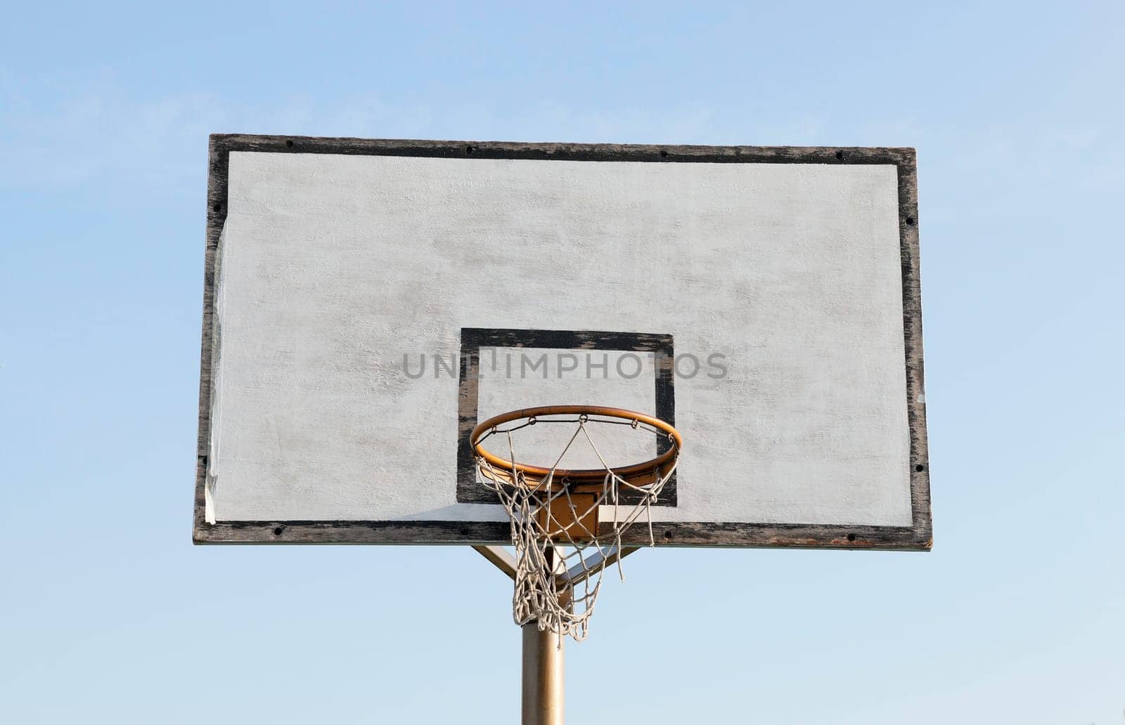 photographed close-up shield and ring for basketball. The site is located in the street