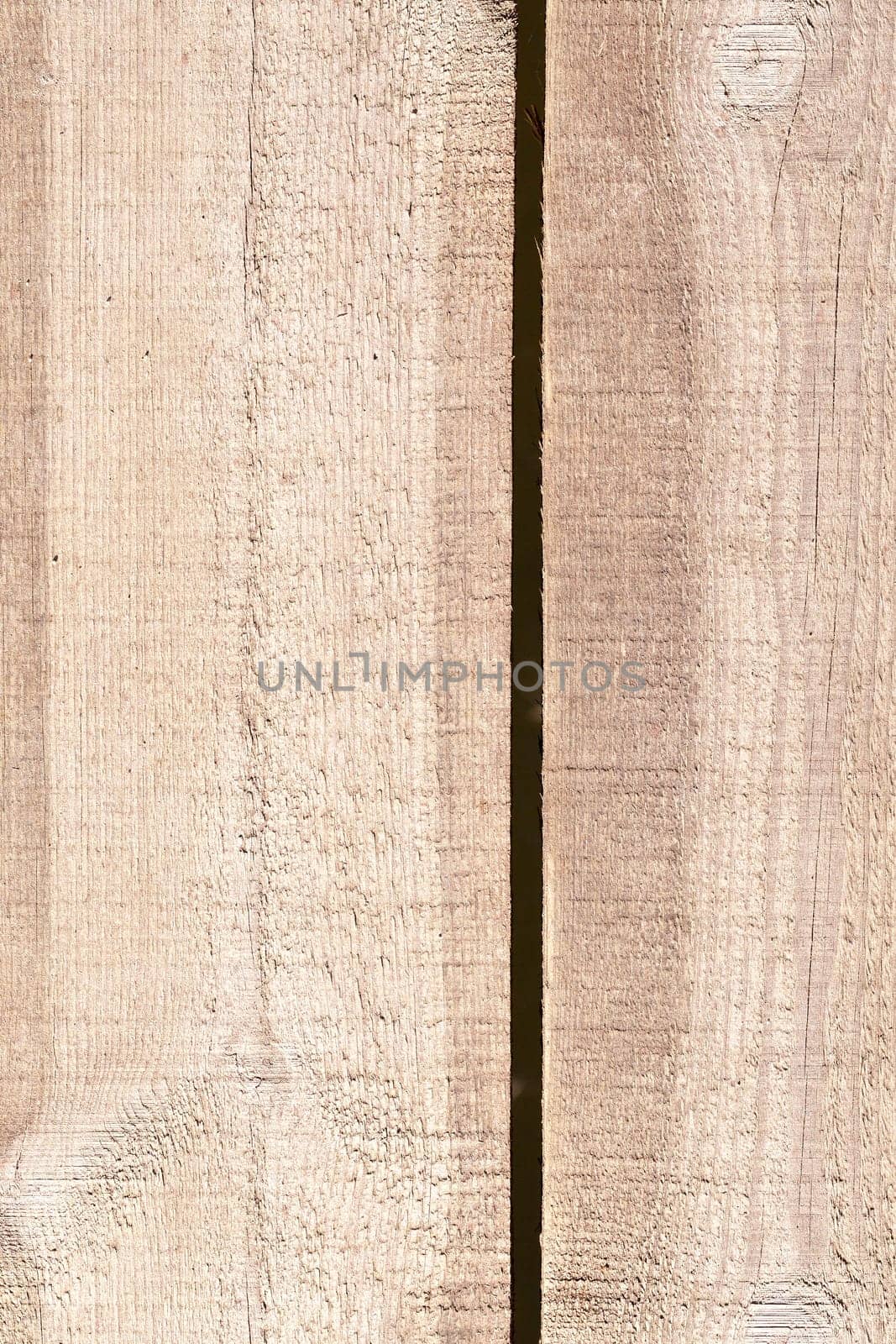 photographed wooden surface made of planks. Part of the old building structure